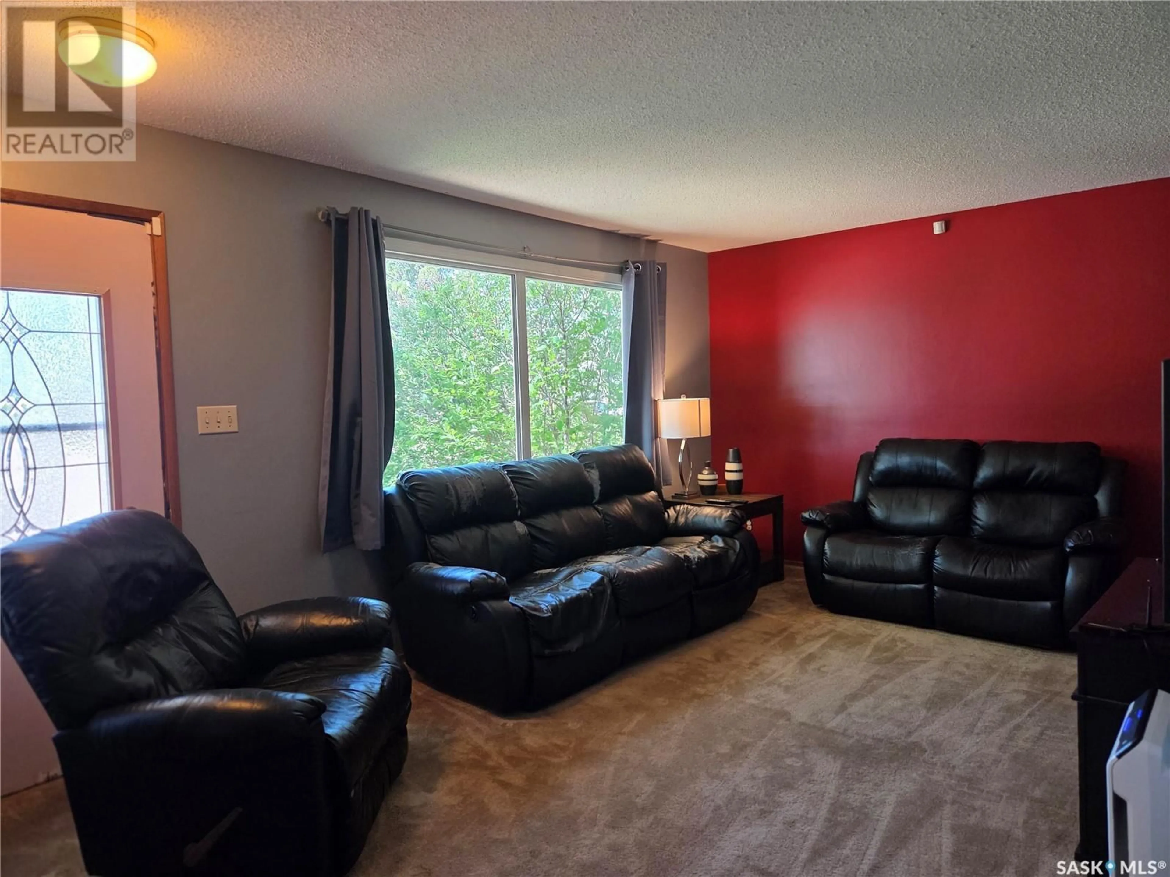 Living room with furniture, unknown for 10208 BORDEN CRESCENT, North Battleford Saskatchewan S9A3A1