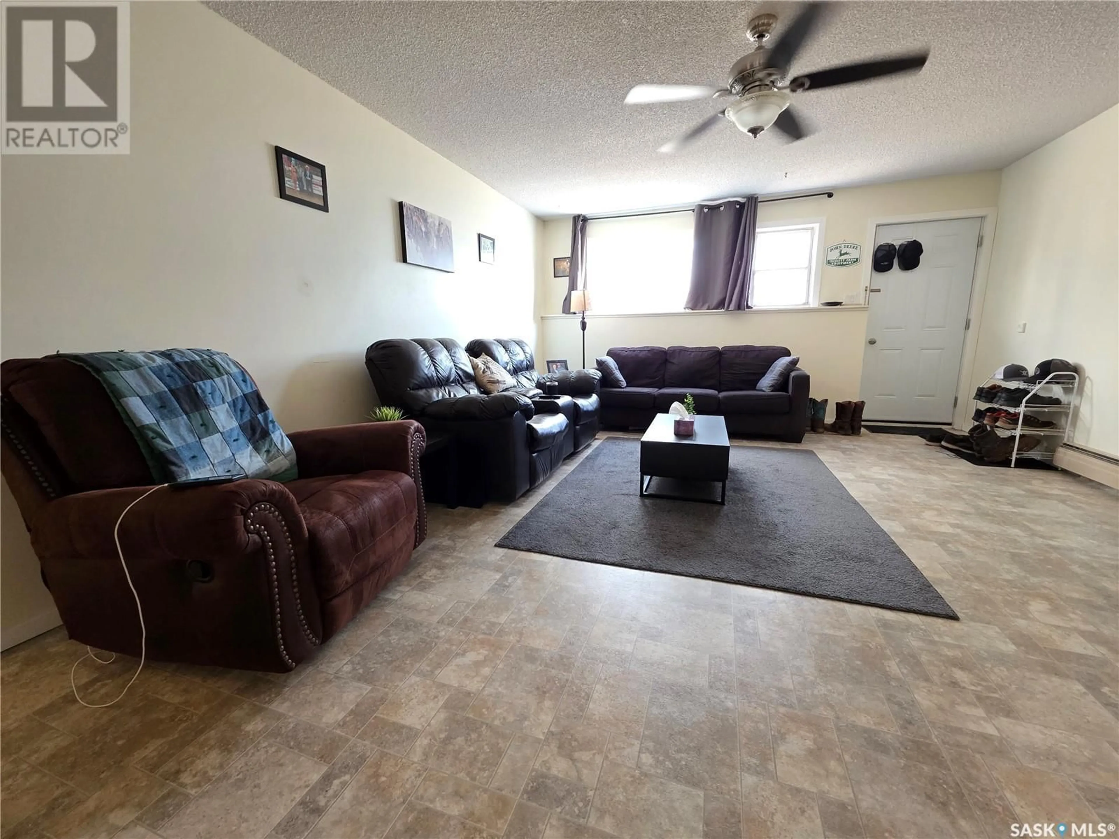 Living room with furniture, unknown for 8 330 13TH AVENUE NE, Swift Current Saskatchewan S9H2W1