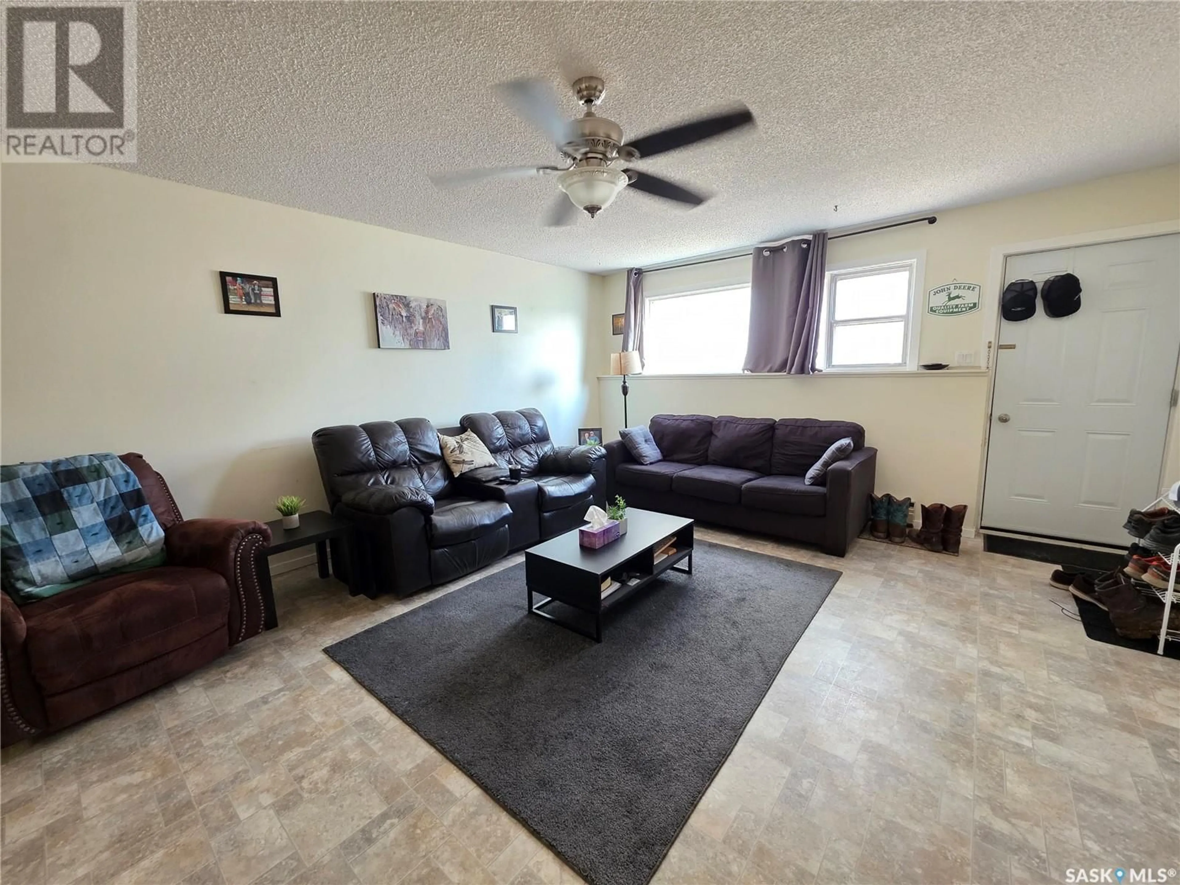 Living room with furniture, unknown for 8 330 13TH AVENUE NE, Swift Current Saskatchewan S9H2W1