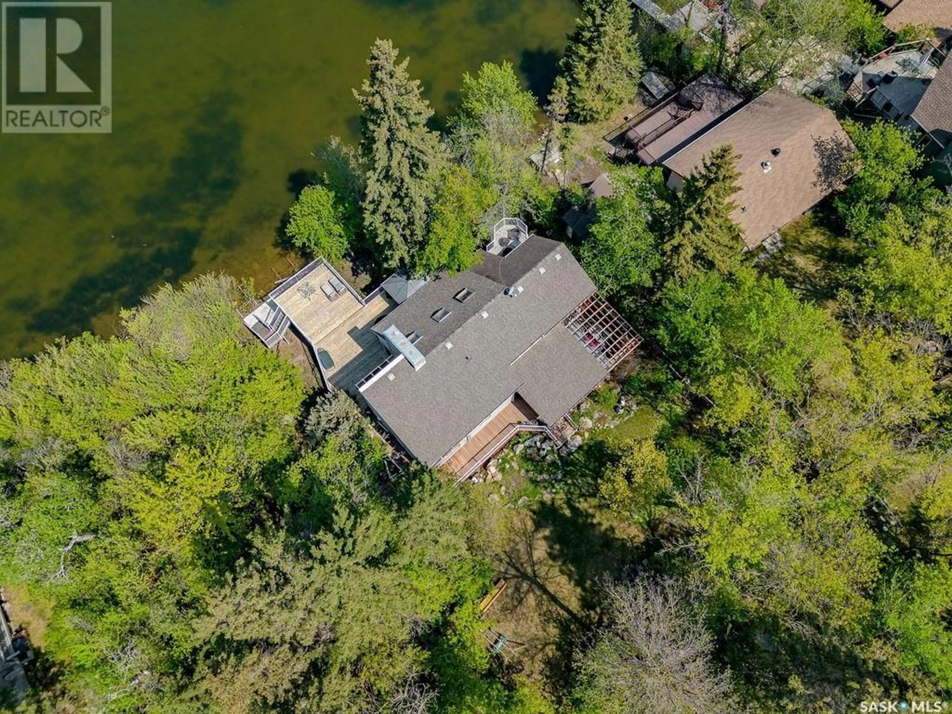 A pic from outside/outdoor area/front of a property/back of a property/a pic from drone, water/lake/river/ocean view for 93 CRESCENT AVENUE, Wakaw Lake Saskatchewan S0K4P0