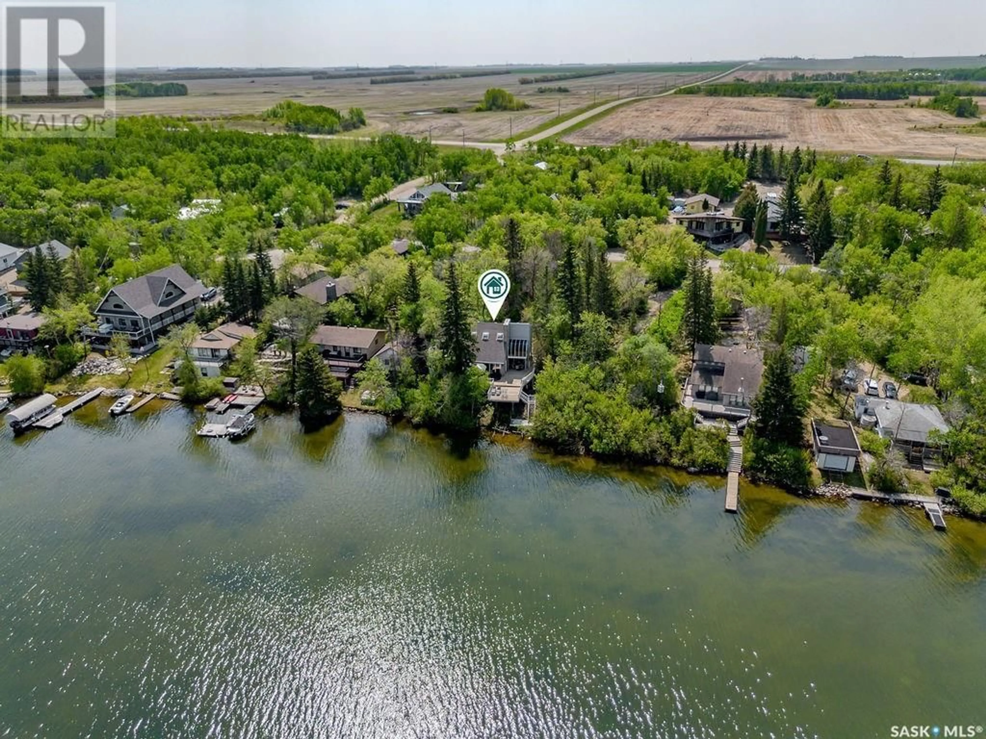 A pic from outside/outdoor area/front of a property/back of a property/a pic from drone, water/lake/river/ocean view for 93 CRESCENT AVENUE, Wakaw Lake Saskatchewan S0K4P0