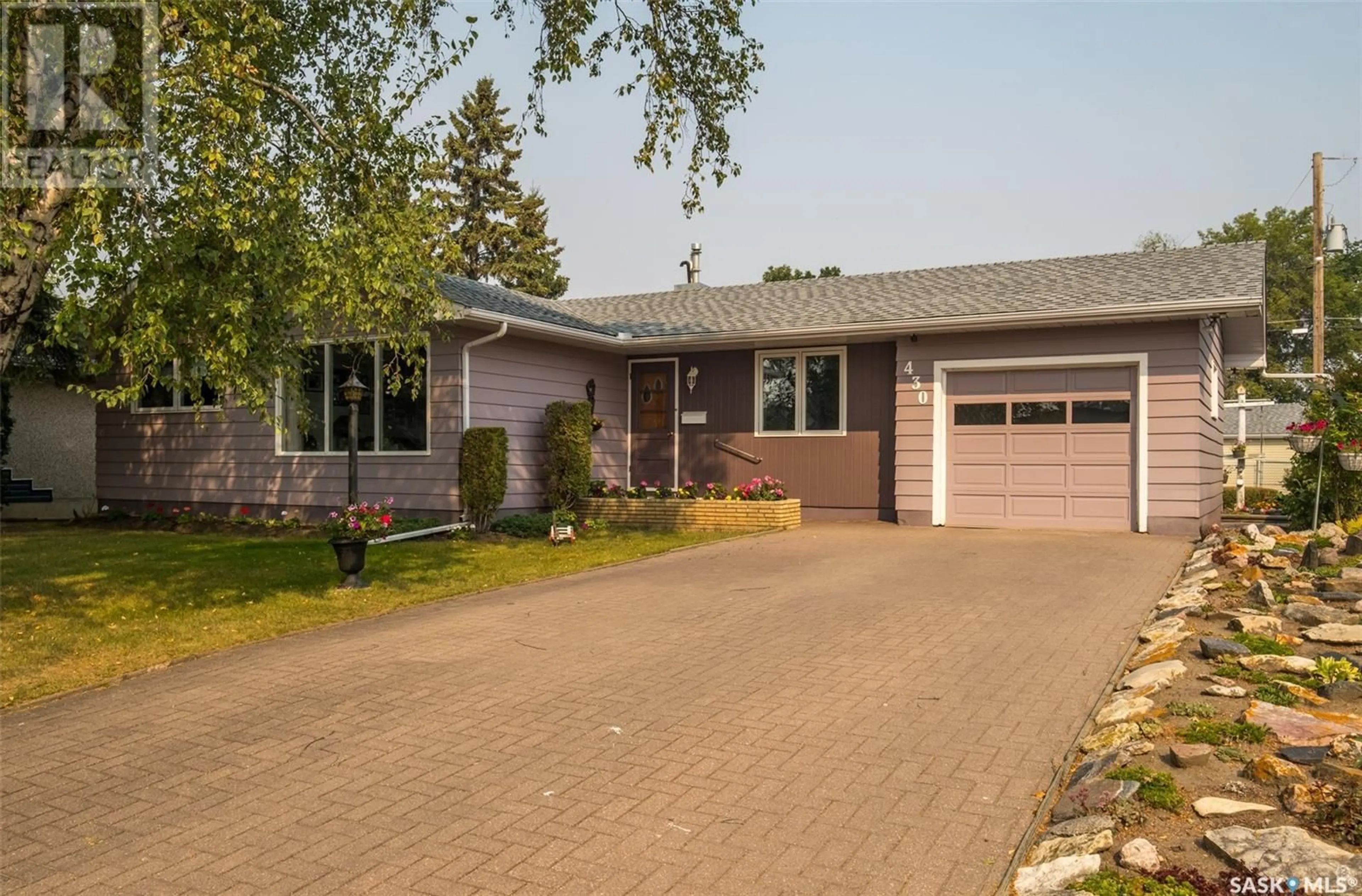 Home with vinyl exterior material, street for 430 27TH STREET, Prince Albert Saskatchewan S6V1W3