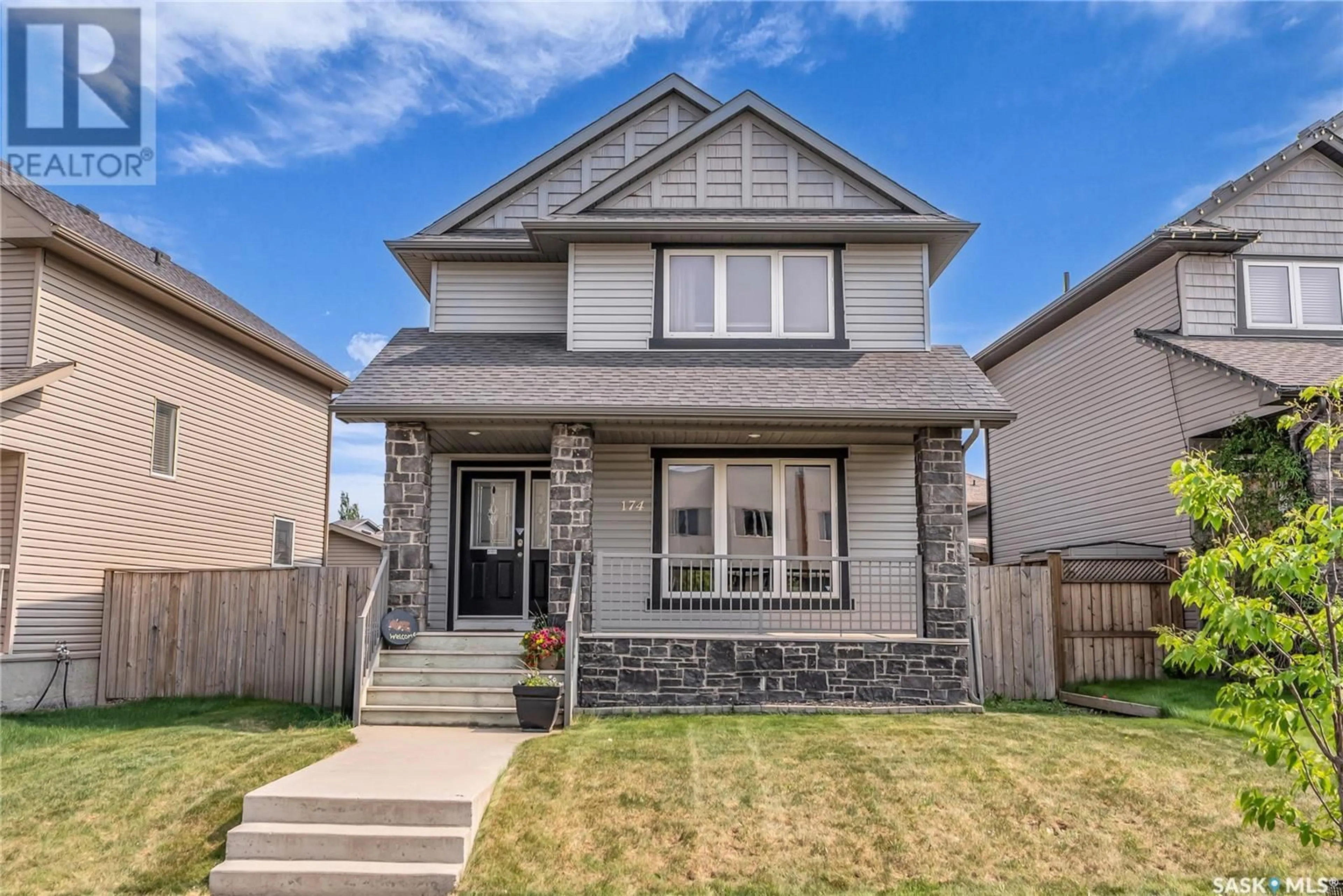 Home with vinyl exterior material, street for 174 CORNISH ROAD, Saskatoon Saskatchewan S7K0K4