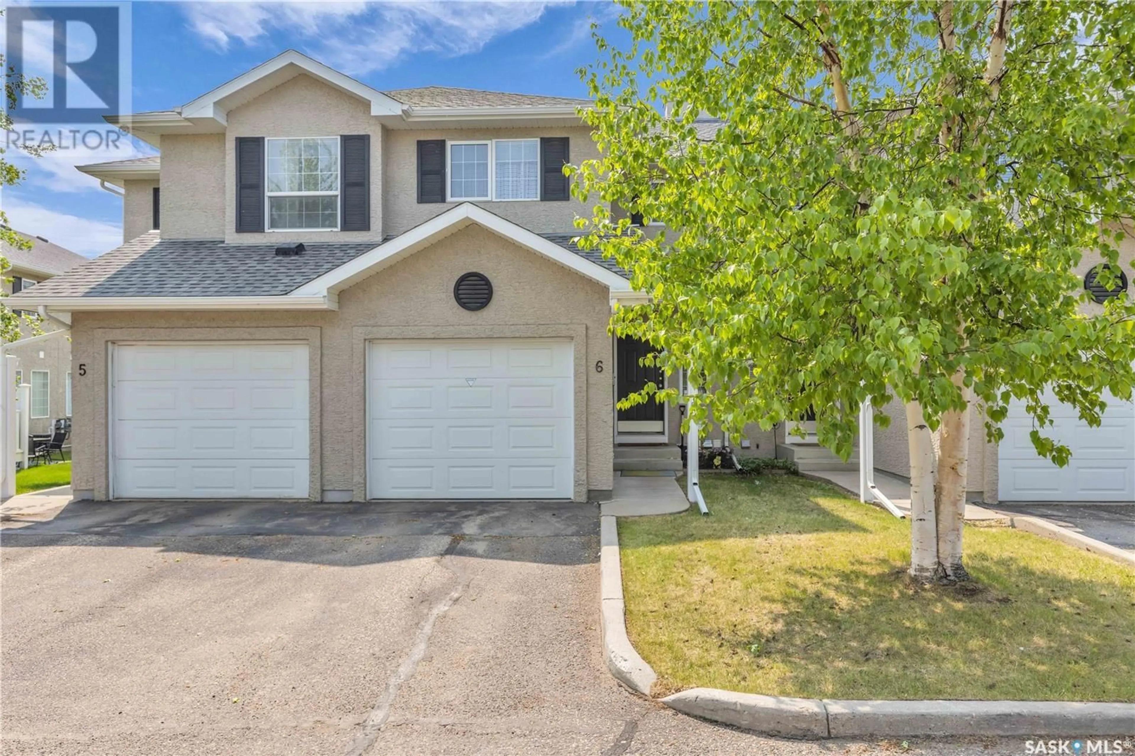 Home with vinyl exterior material, street for 6 103 BANYAN CRESCENT, Saskatoon Saskatchewan S7V1G2