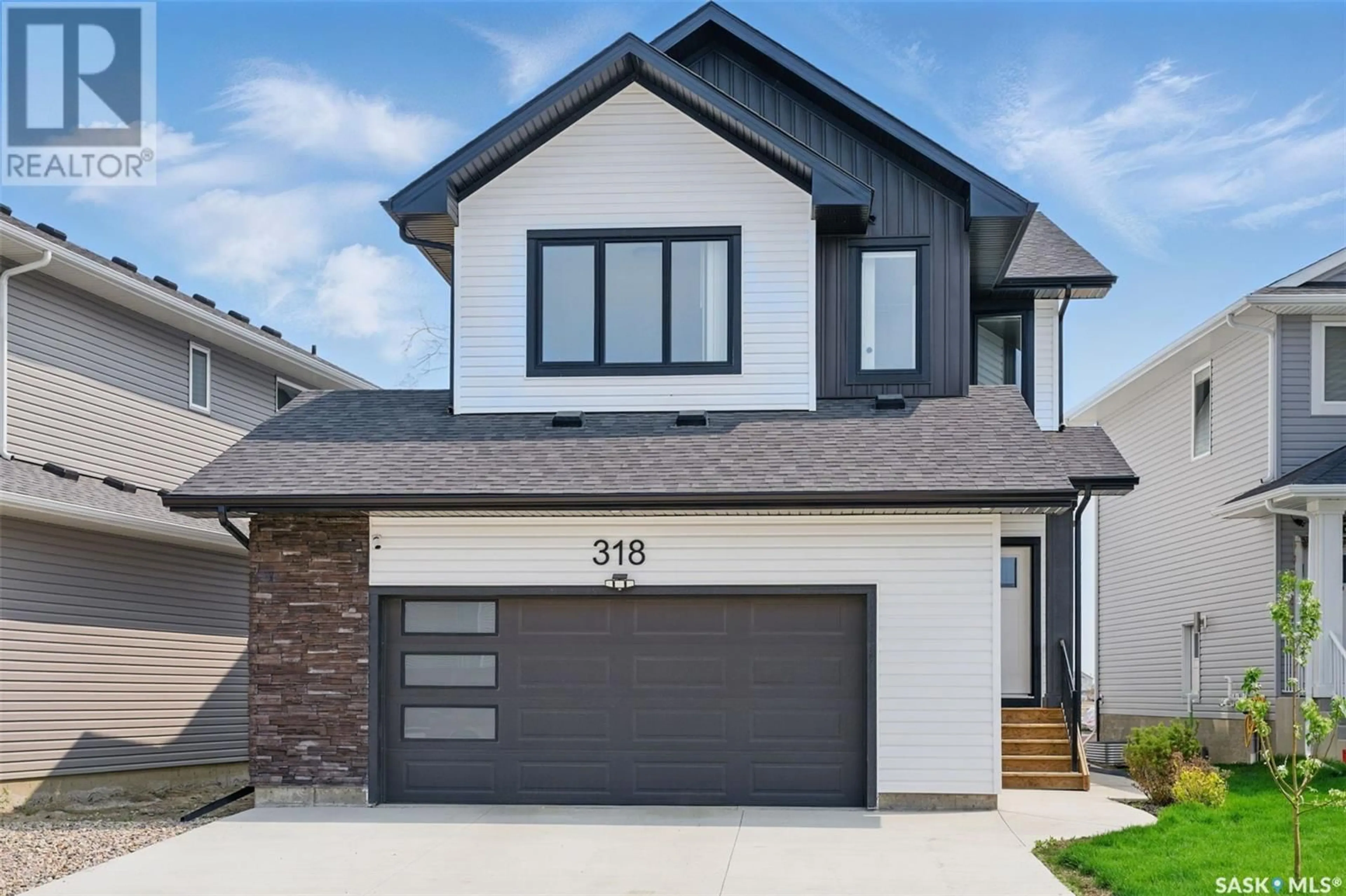 Home with brick exterior material, street for 318 PRASAD UNION, Saskatoon Saskatchewan S7V1L7