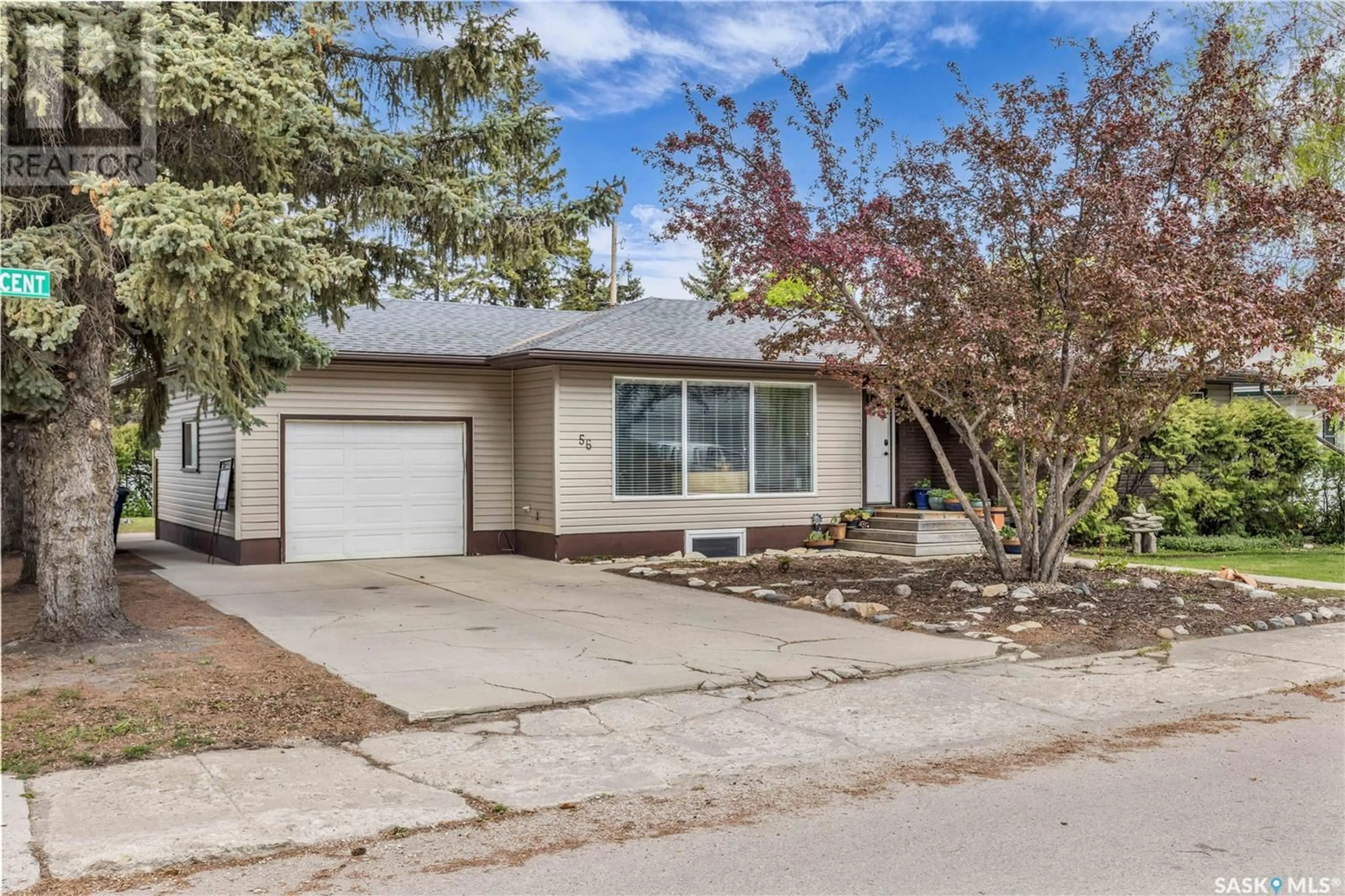 Home with vinyl exterior material, street for 56 KING CRESCENT, Humboldt Saskatchewan S0K2A0