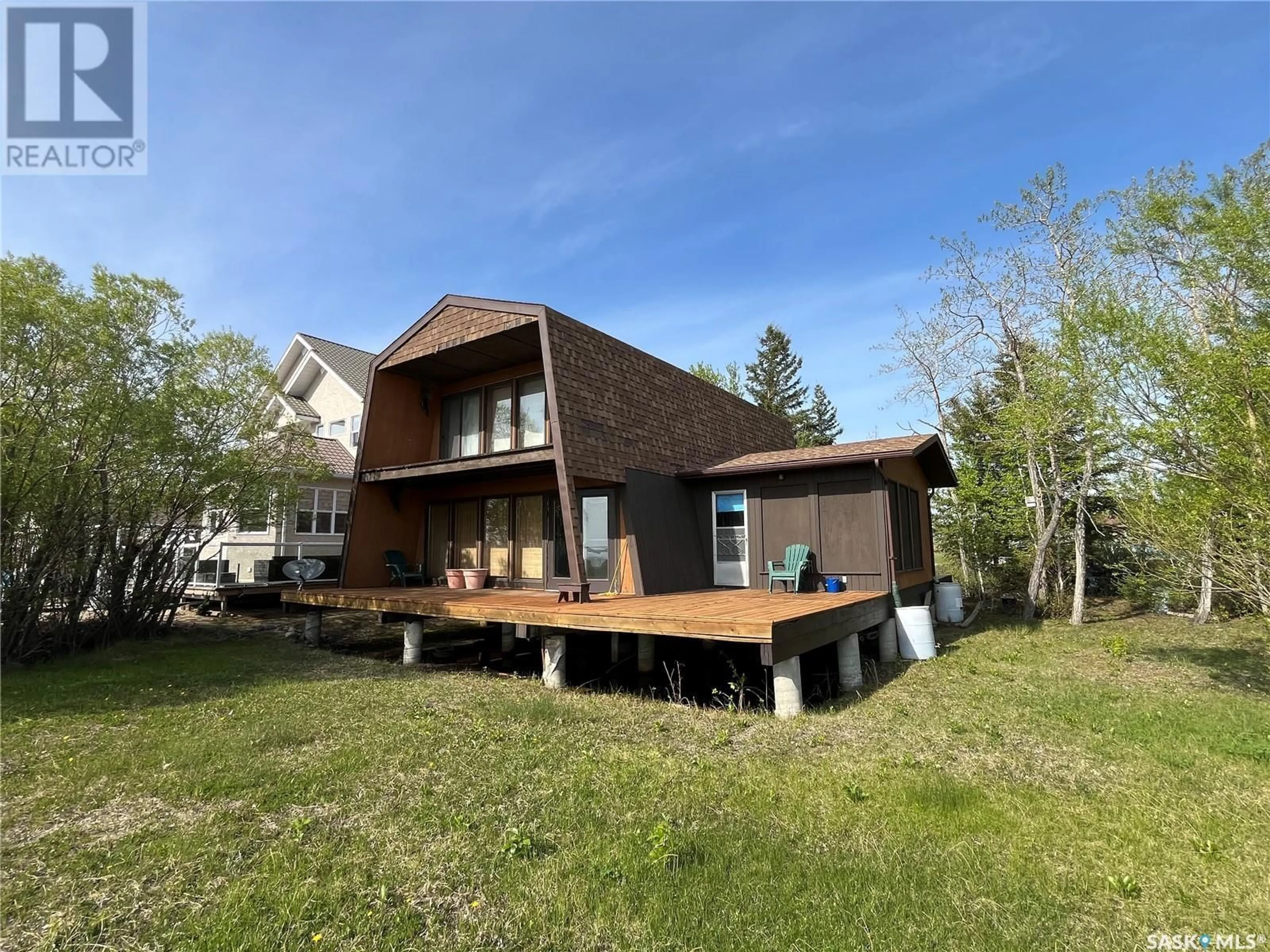 Home with vinyl exterior material, unknown for 118-119 MURRAY CRESCENT, Fishing Lake Saskatchewan S0A1A0