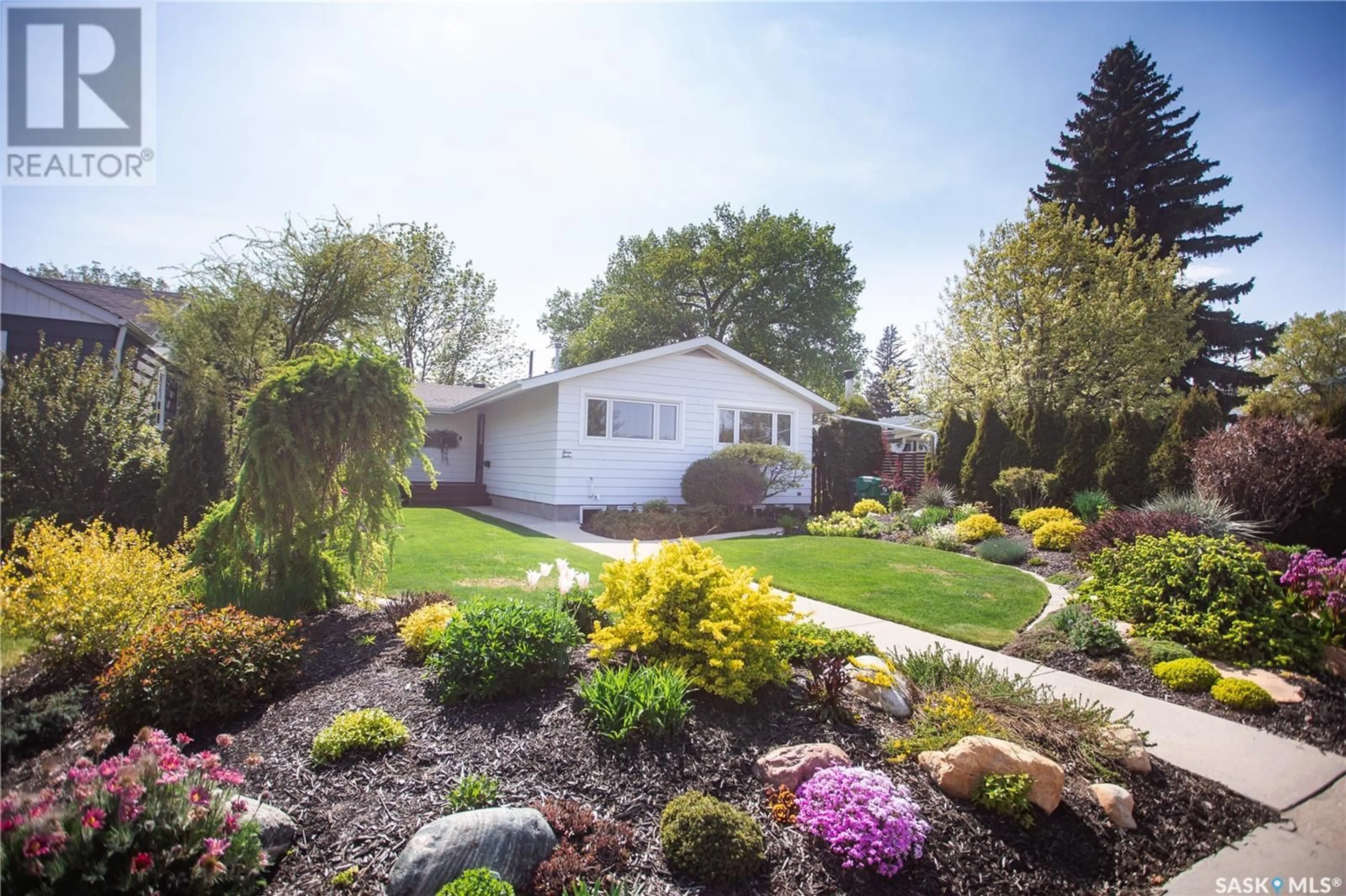 Home with vinyl exterior material, street for 312 BATE CRESCENT, Saskatoon Saskatchewan S7H3A5
