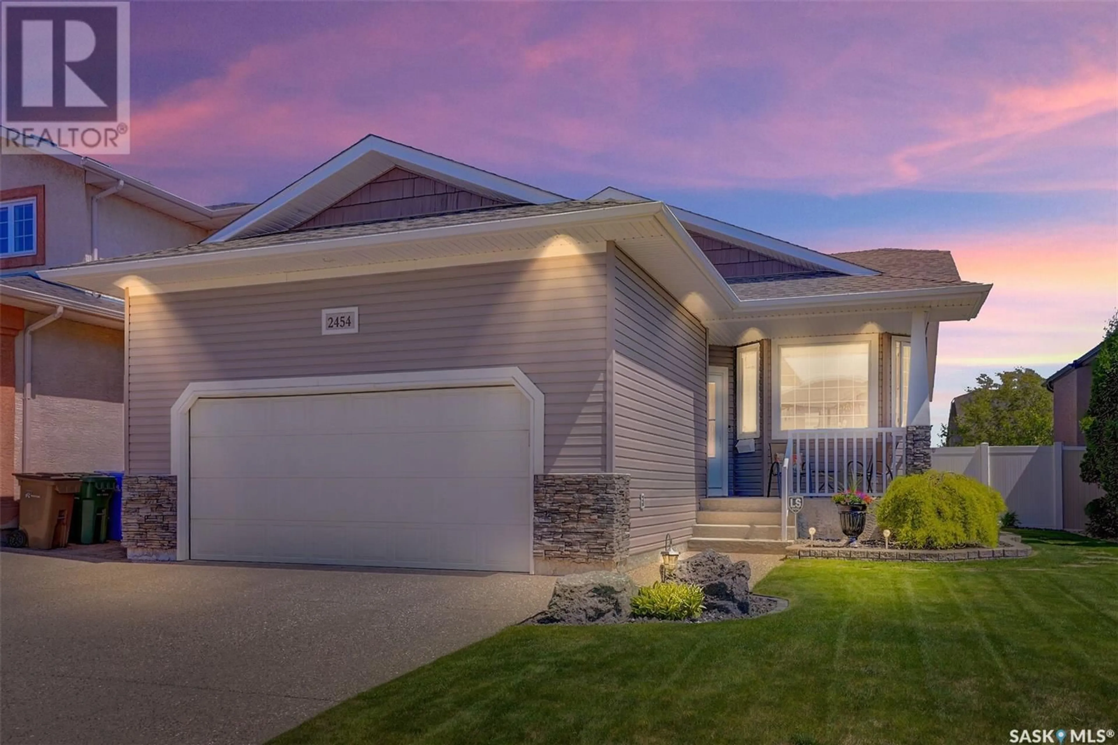 Home with vinyl exterior material, street for 2454 JAMESON CRESCENT, Regina Saskatchewan S4V1J7
