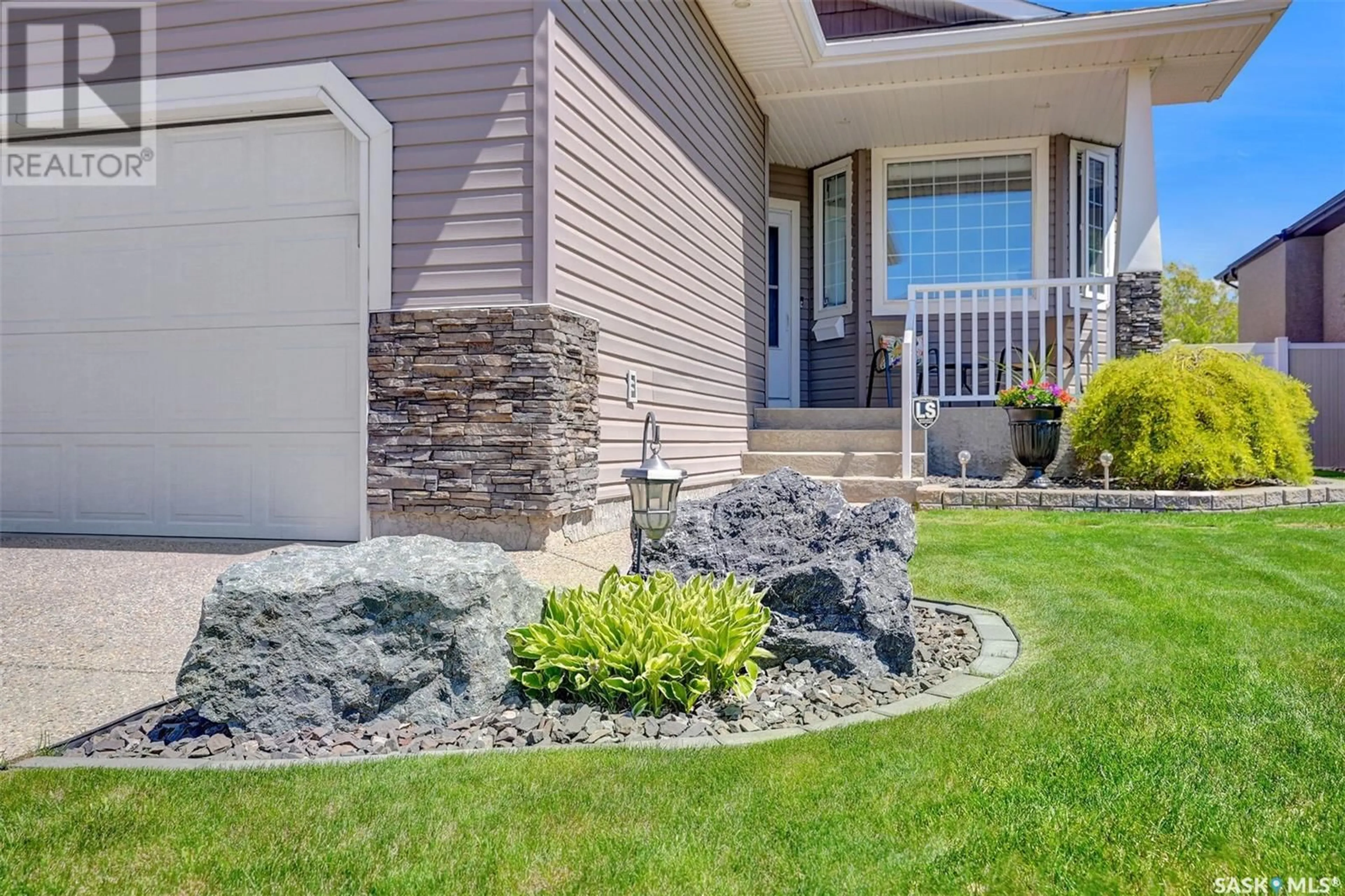 Home with vinyl exterior material, street for 2454 JAMESON CRESCENT, Regina Saskatchewan S4V1J7