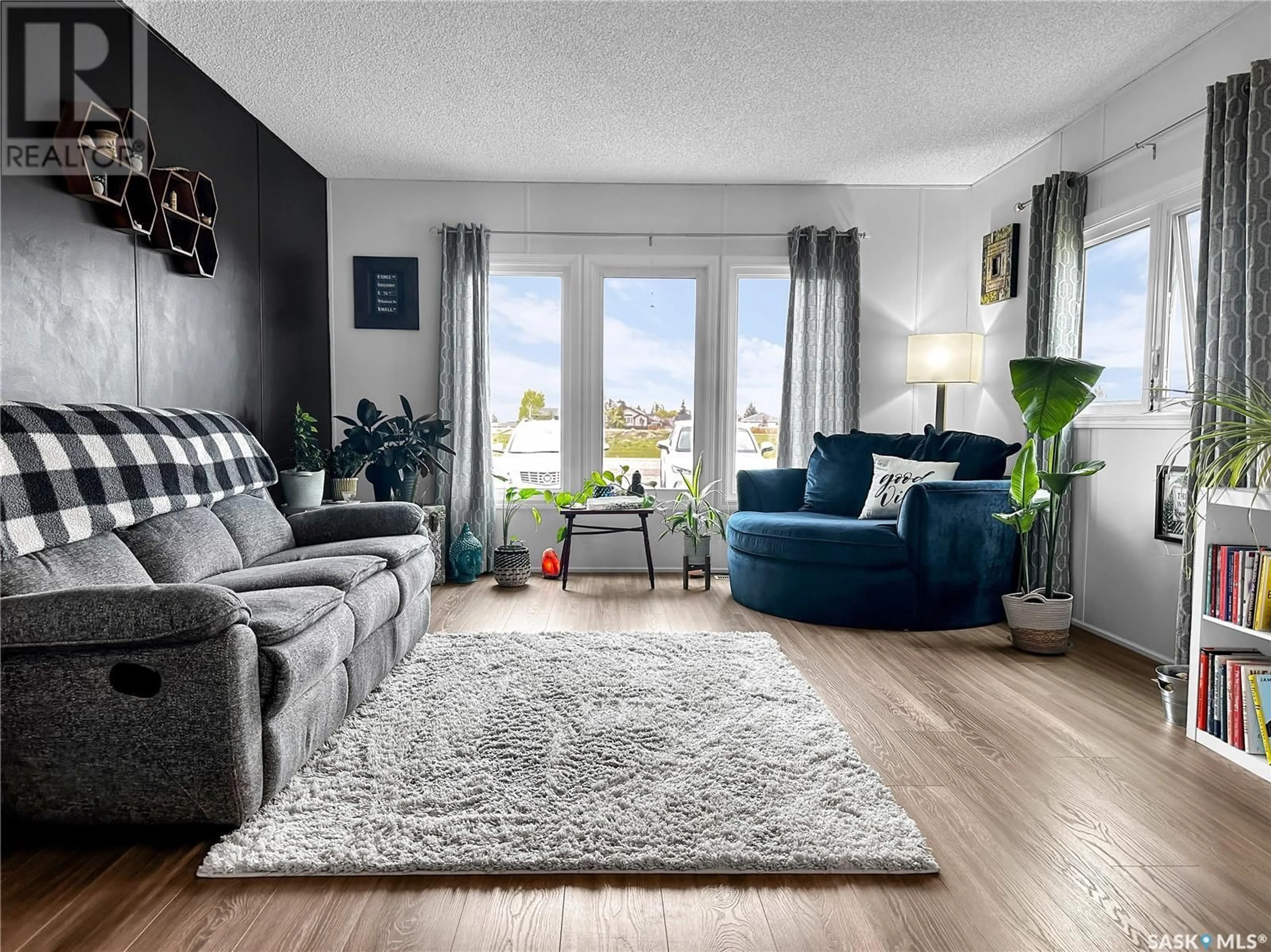 Living room with furniture, unknown for 471 35TH STREET, Battleford Saskatchewan S0M0E0