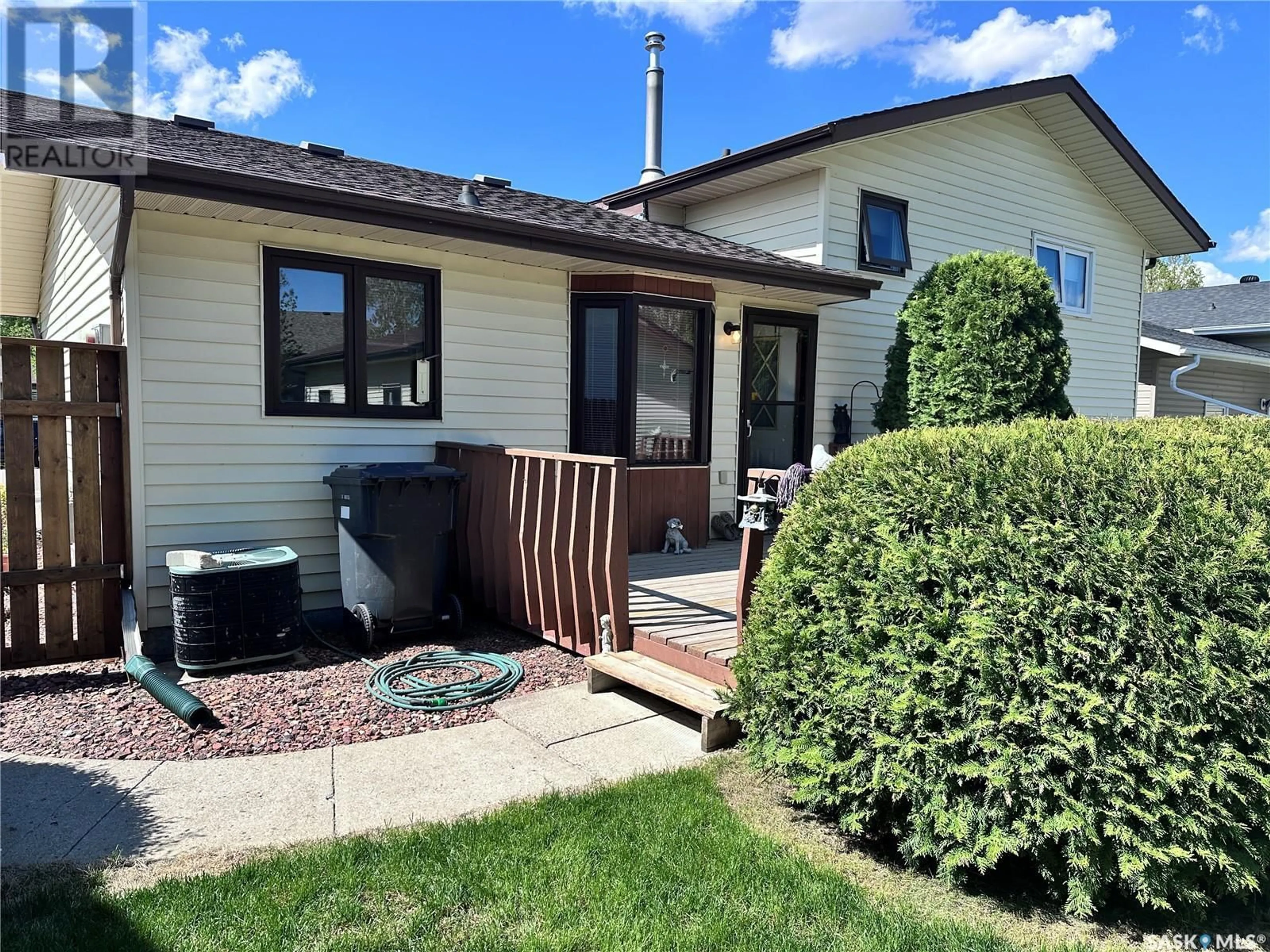 Home with vinyl exterior material, street for 619 DIEPPE DRIVE, Weyburn Saskatchewan S4H3K9