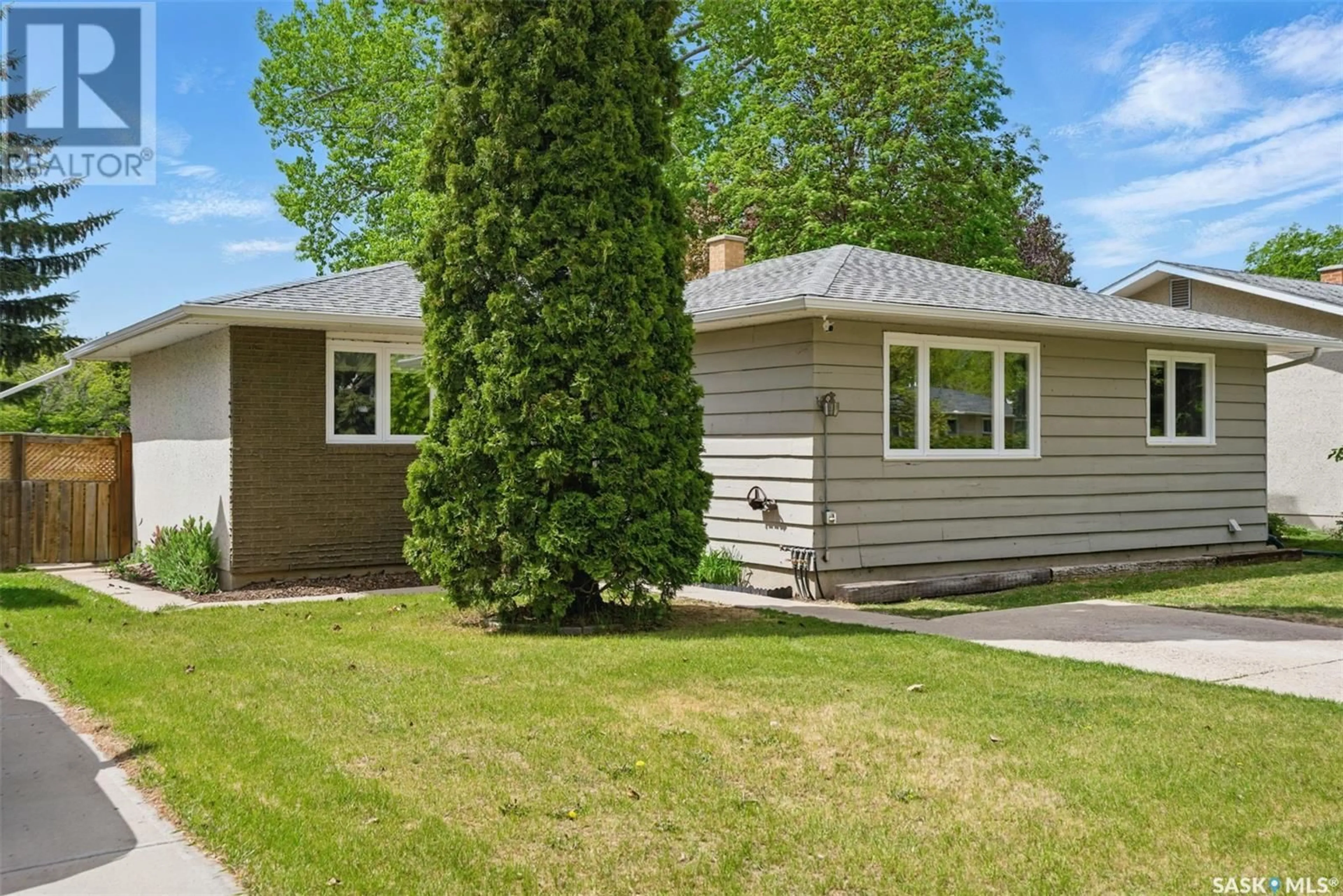 Home with vinyl exterior material, street for 80 SPARLING CRESCENT, Saskatoon Saskatchewan S7H3M2