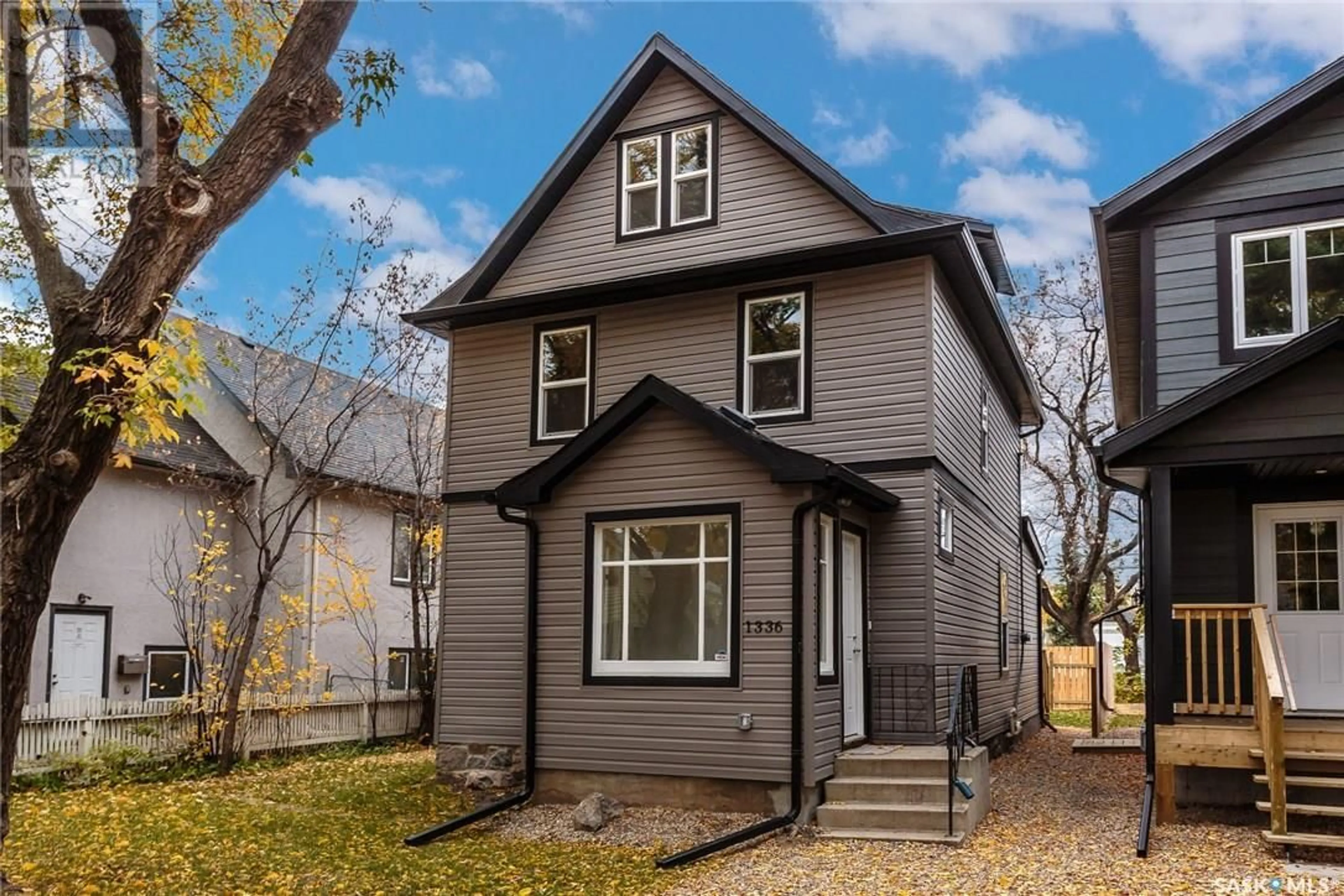 Home with vinyl exterior material, street for 1336 B AVENUE, Saskatoon Saskatchewan S7L1G5
