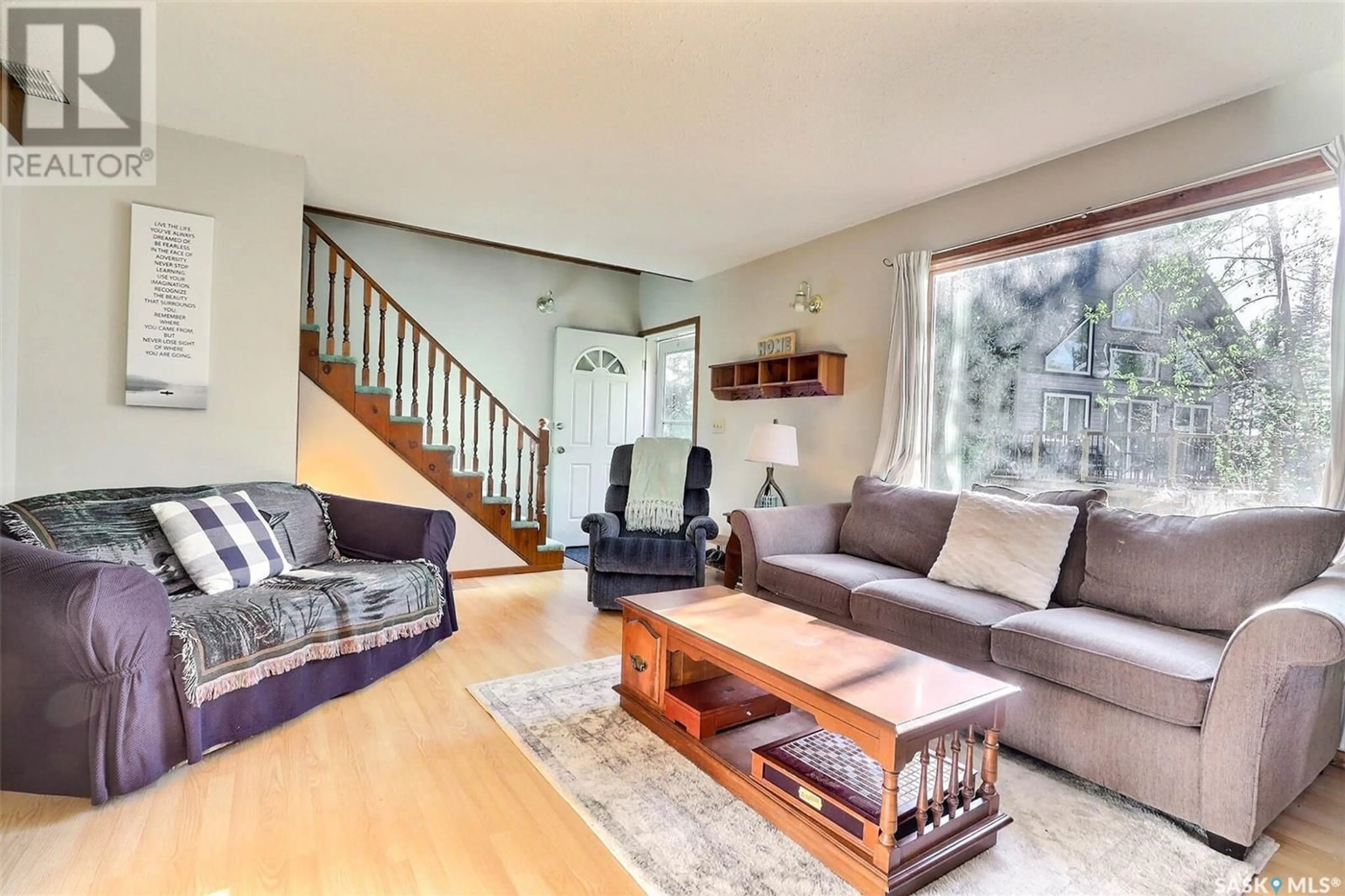 Living room with furniture, wood/laminate floor for 2 3RD CRESCENT, Candle Lake Saskatchewan S0J3E0