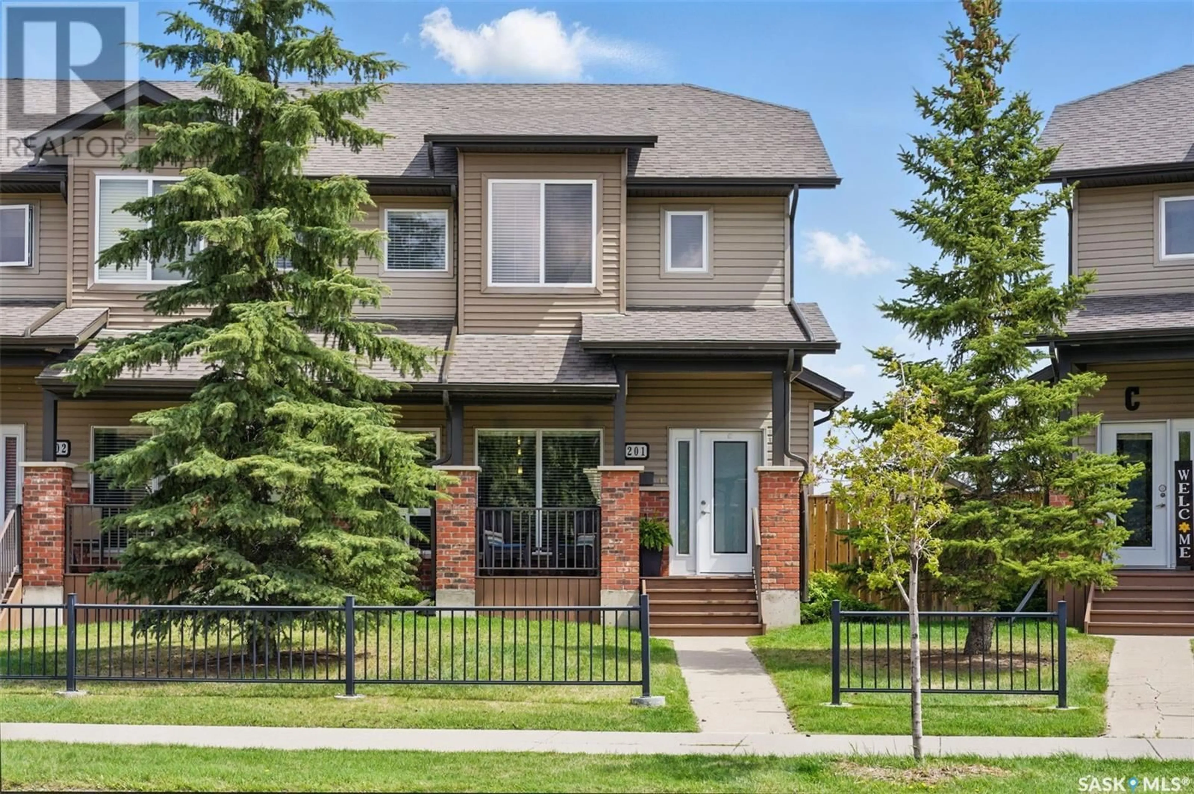 Home with brick exterior material, street for 201 STENSRUD ROAD, Saskatoon Saskatchewan S7W0E3