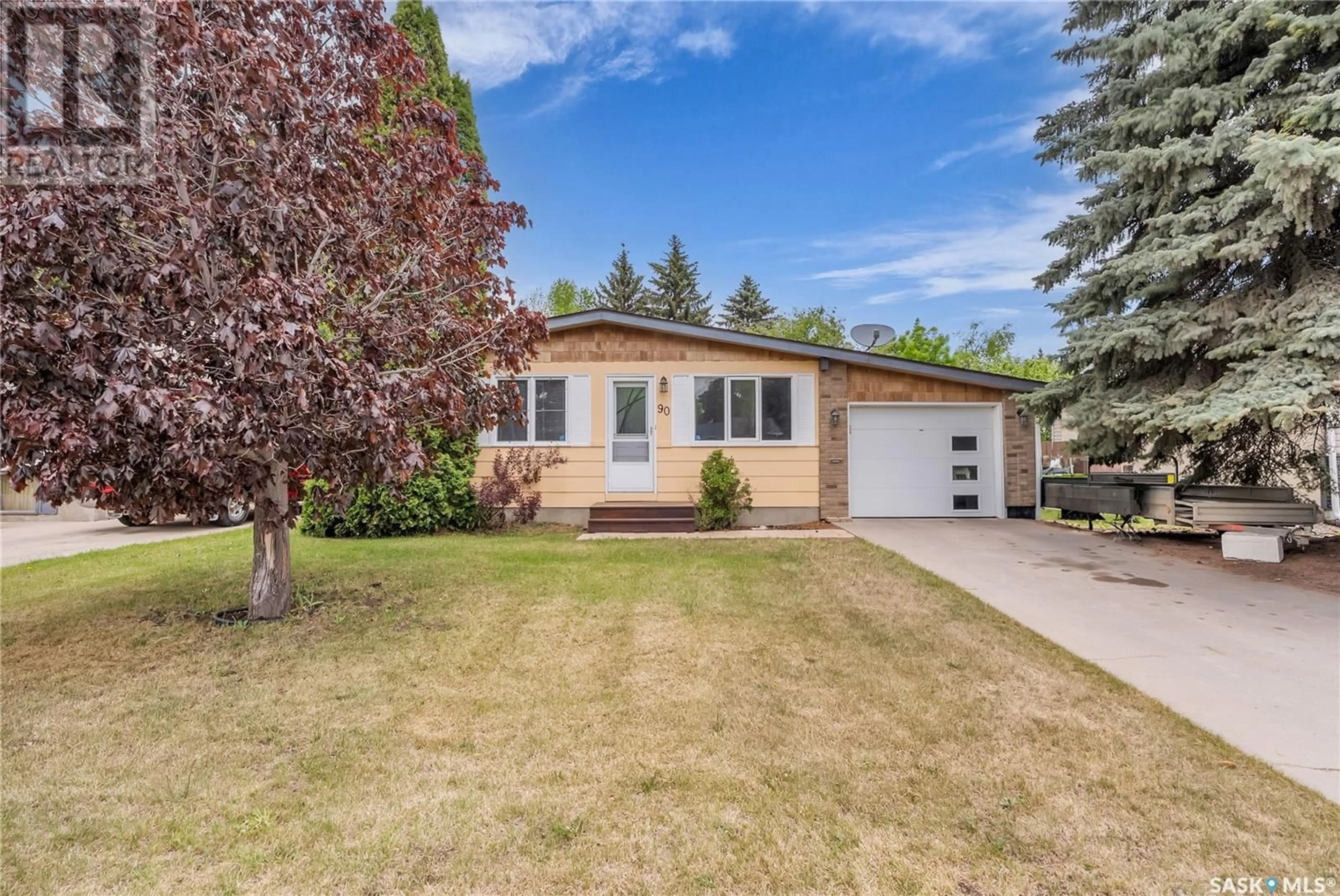 Home with vinyl exterior material, street for 90 CHURCHILL DRIVE, Saskatoon Saskatchewan S7K3X4