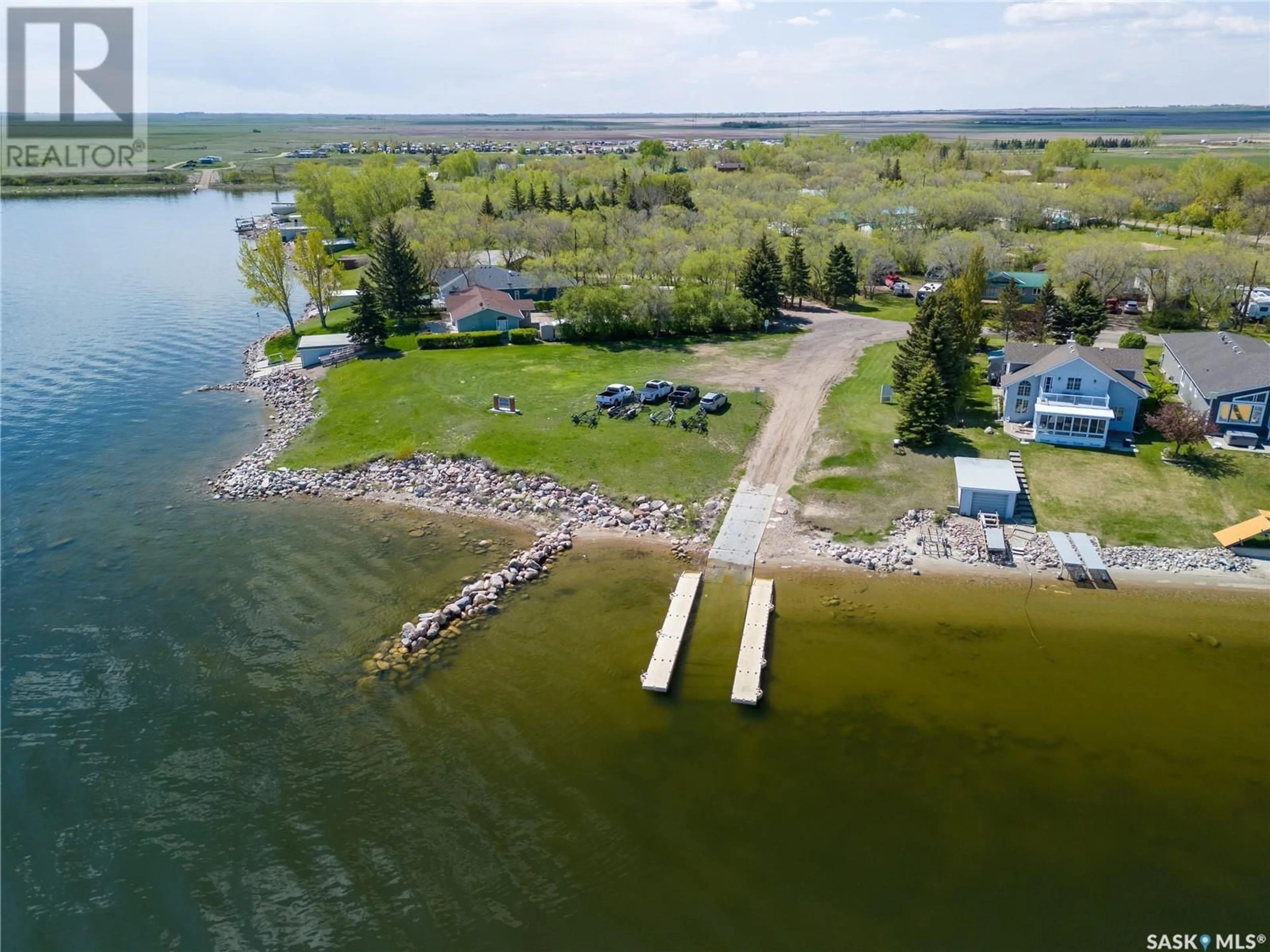 A pic from outside/outdoor area/front of a property/back of a property/a pic from drone, water/lake/river/ocean view for 237 AMY AVENUE, Alice Beach Saskatchewan S0G1C0