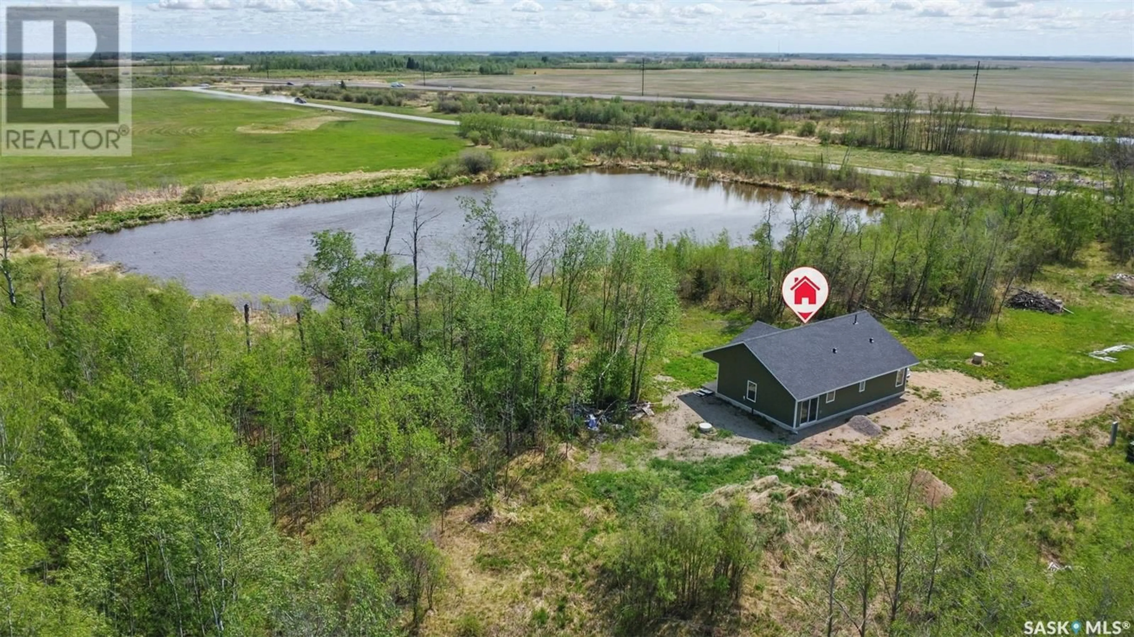 A pic from outside/outdoor area/front of a property/back of a property/a pic from drone, water/lake/river/ocean view for 304 RAILWAY AVENUE, Meath Park Saskatchewan S0J1T0