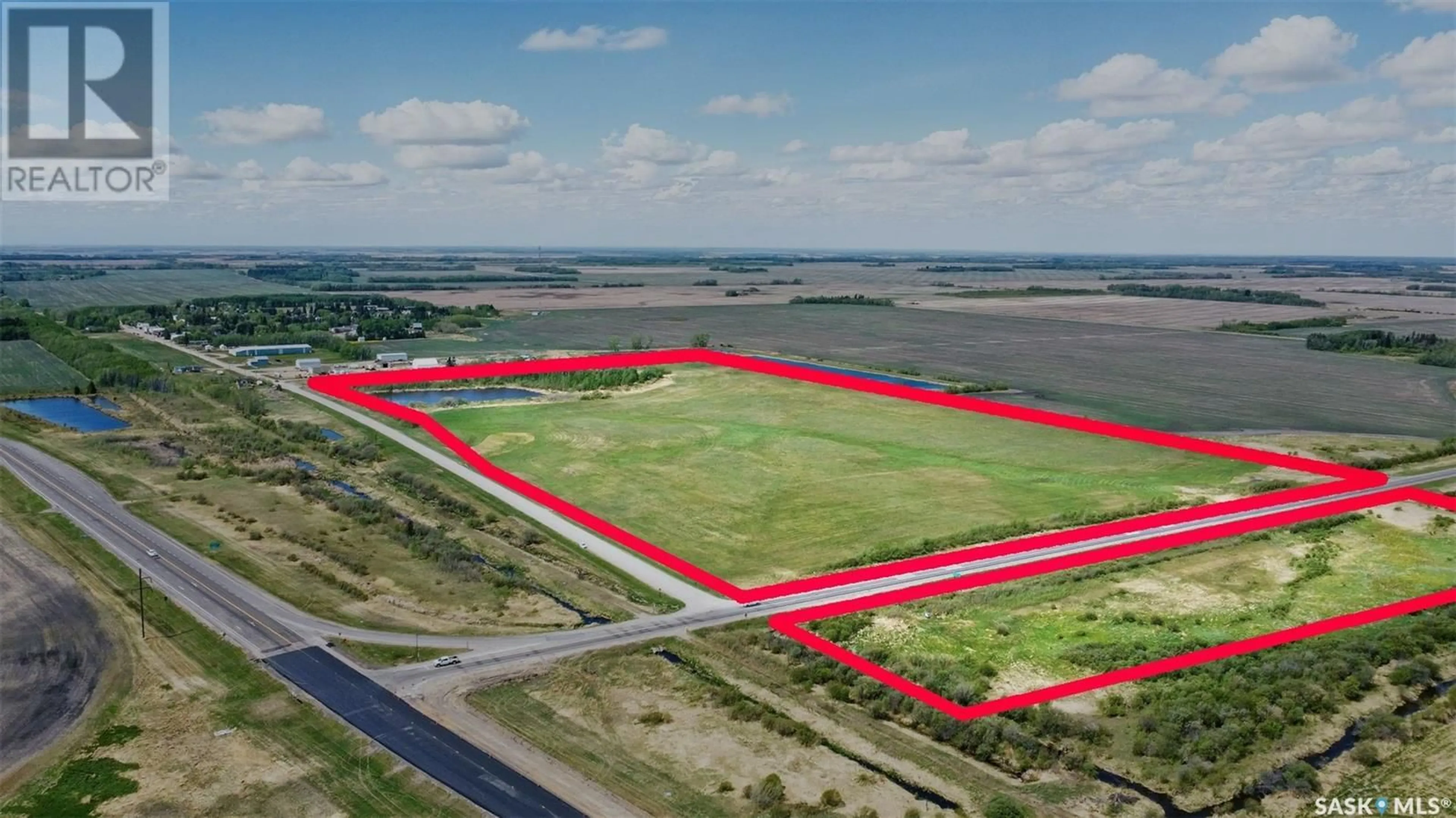 A pic from outside/outdoor area/front of a property/back of a property/a pic from drone, building for 304 RAILWAY AVENUE, Meath Park Saskatchewan S0J1T0
