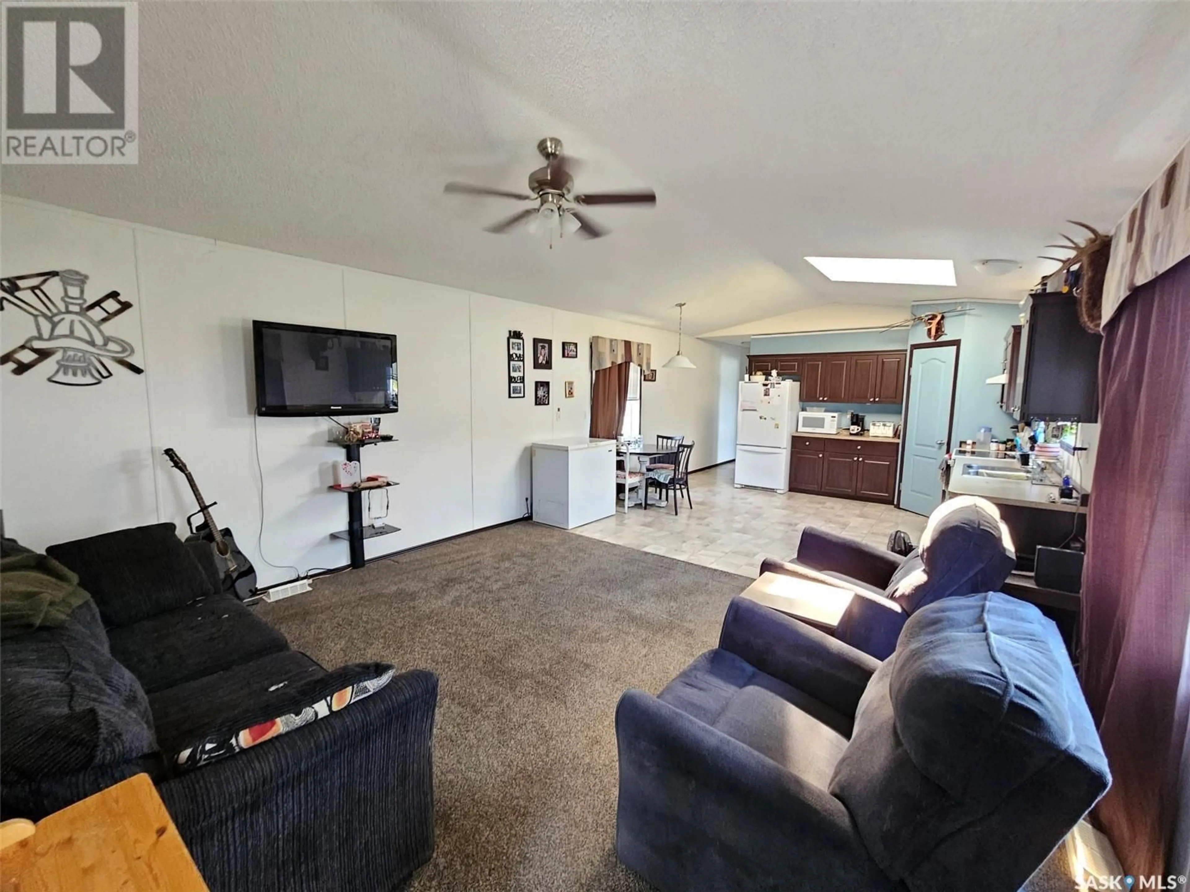 Living room with furniture, unknown for 8 MILLER STREET, Redvers Saskatchewan S0C2H0