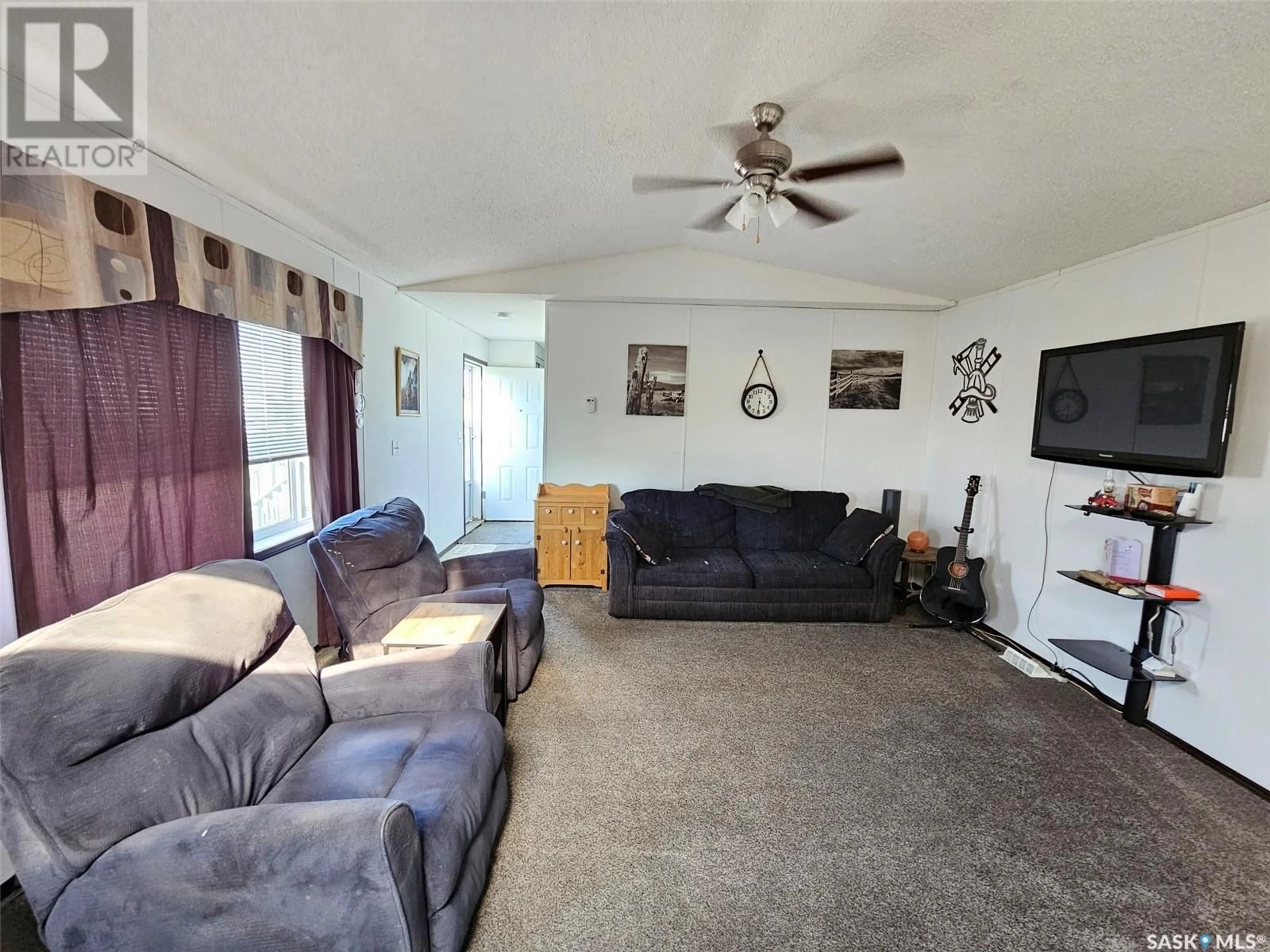Living room with furniture, unknown for 8 MILLER STREET, Redvers Saskatchewan S0C2H0