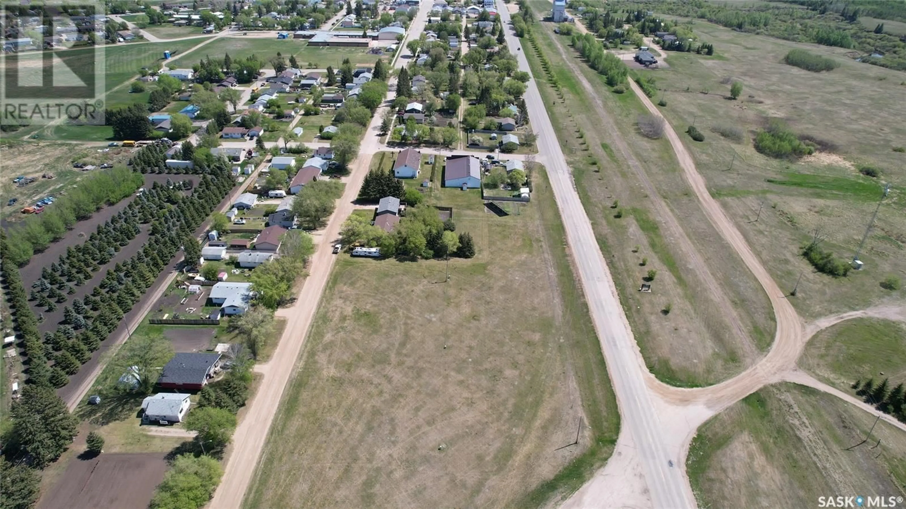 A pic from outside/outdoor area/front of a property/back of a property/a pic from drone, street for 7 3RD STREET, Preeceville Saskatchewan S0A3B0