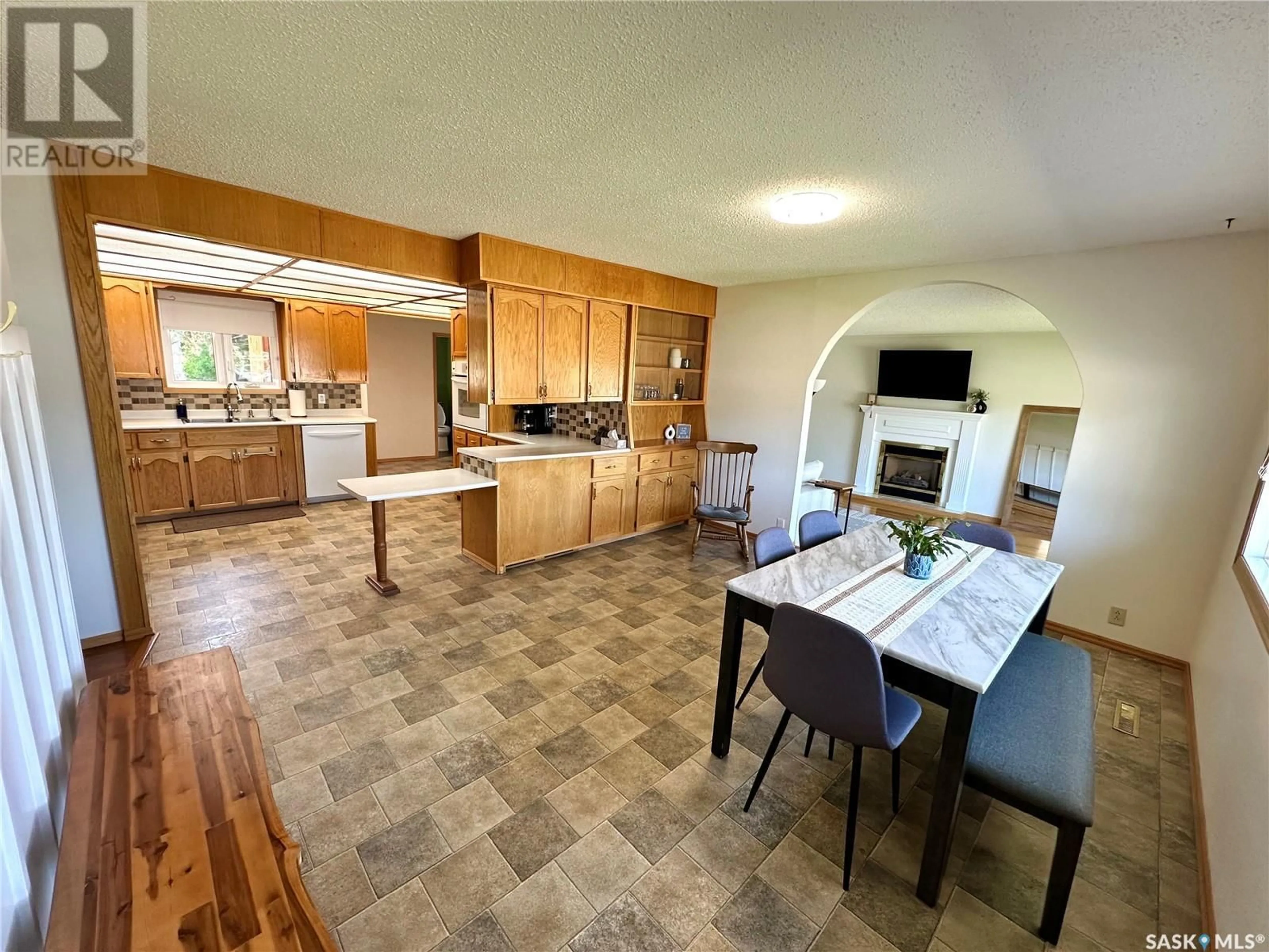 Open concept kitchen, ceramic/tile floor for 8005 6TH STREET, Rosthern Saskatchewan S0K3R0