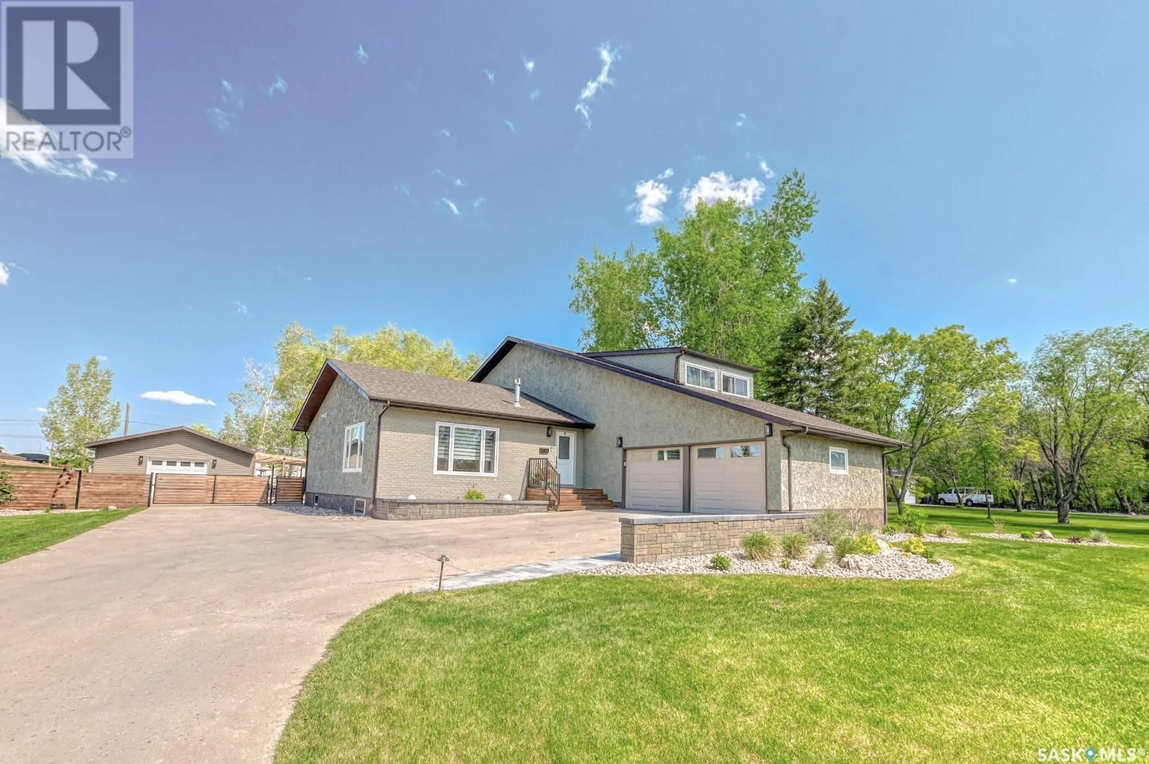 Home with vinyl exterior material, street for 9 MEADOW ROAD, White City Saskatchewan S0G5B0