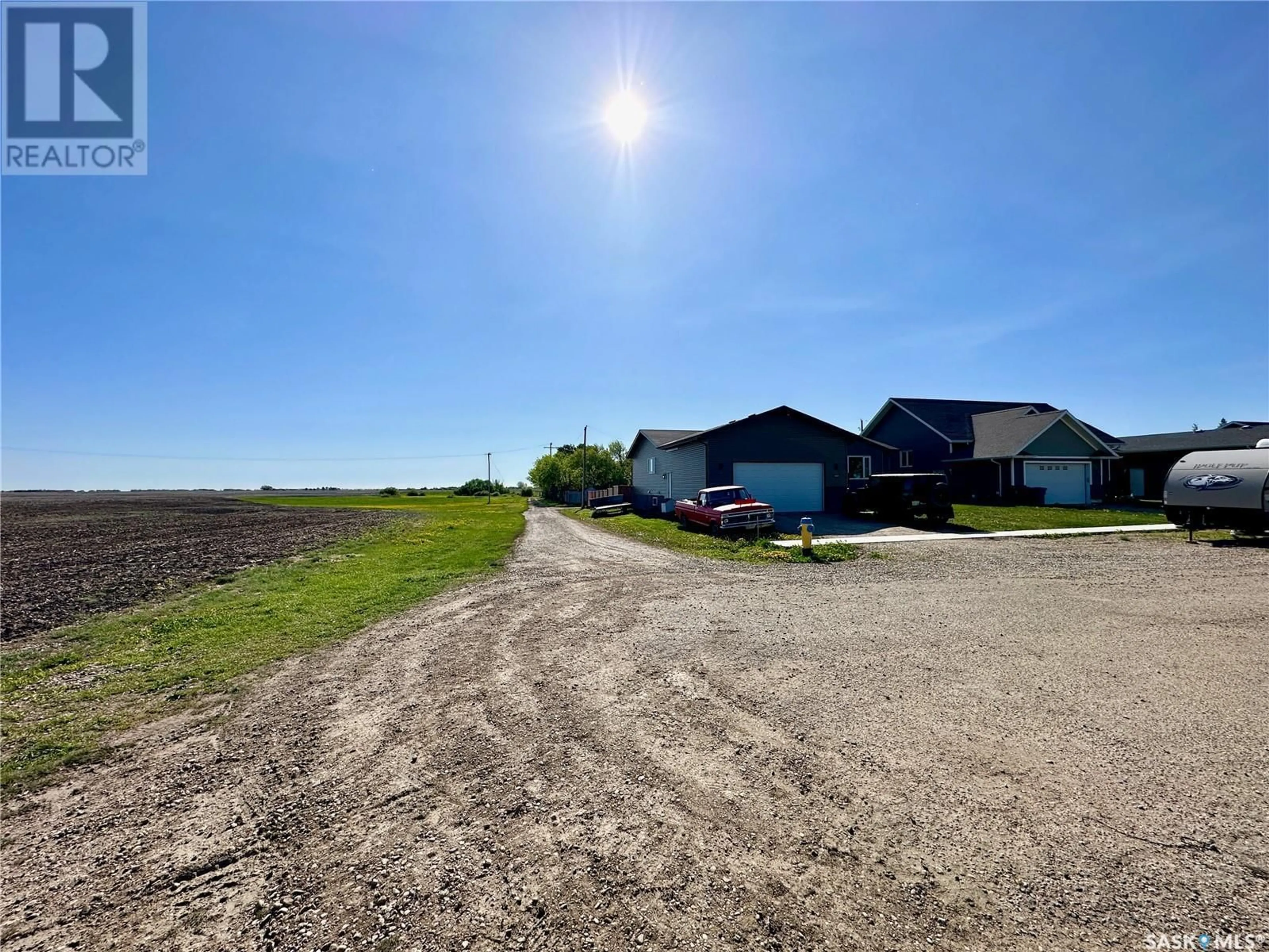 A pic from outside/outdoor area/front of a property/back of a property/a pic from drone, unknown for 308 MAPLE DRIVE, Allan Saskatchewan S0K0C0