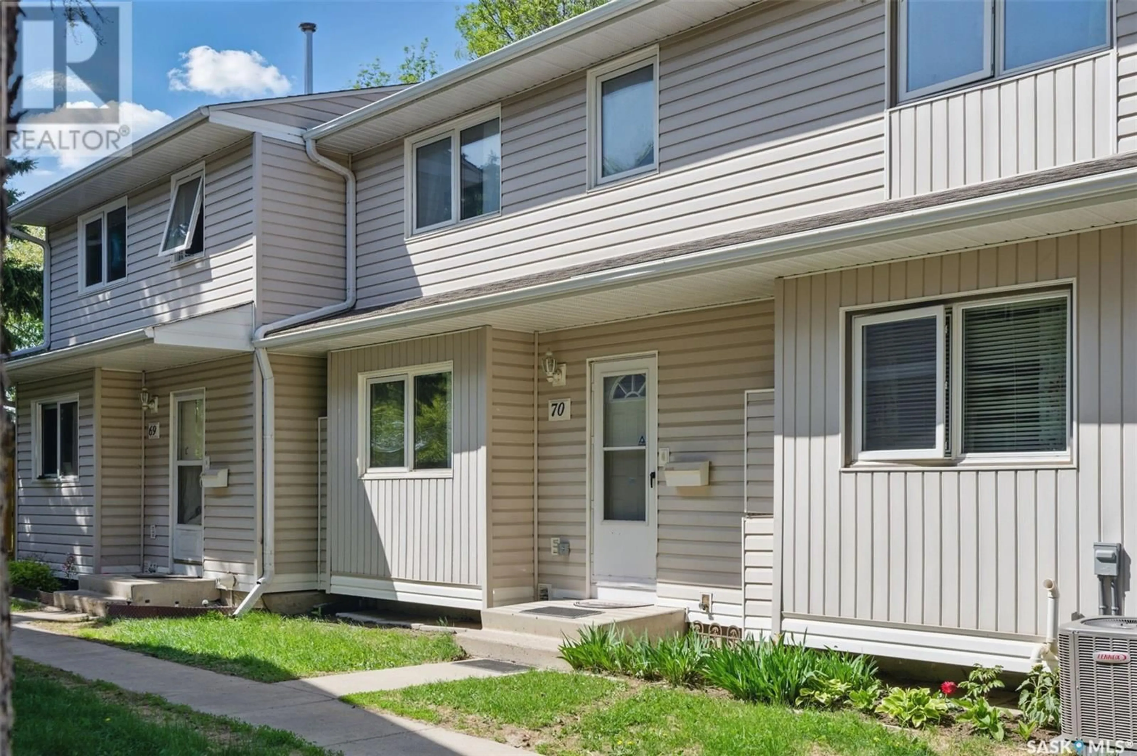 Home with vinyl exterior material, street for 70 330 HAIGHT CRESCENT, Saskatoon Saskatchewan S7H4V9
