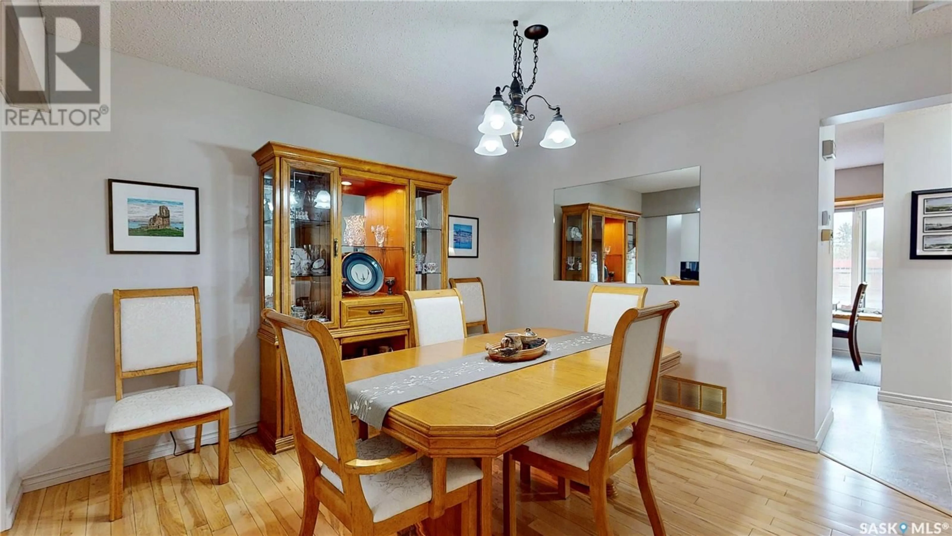 Dining room, wood/laminate floor for 3903 GORDON ROAD, Regina Saskatchewan S4S6G6