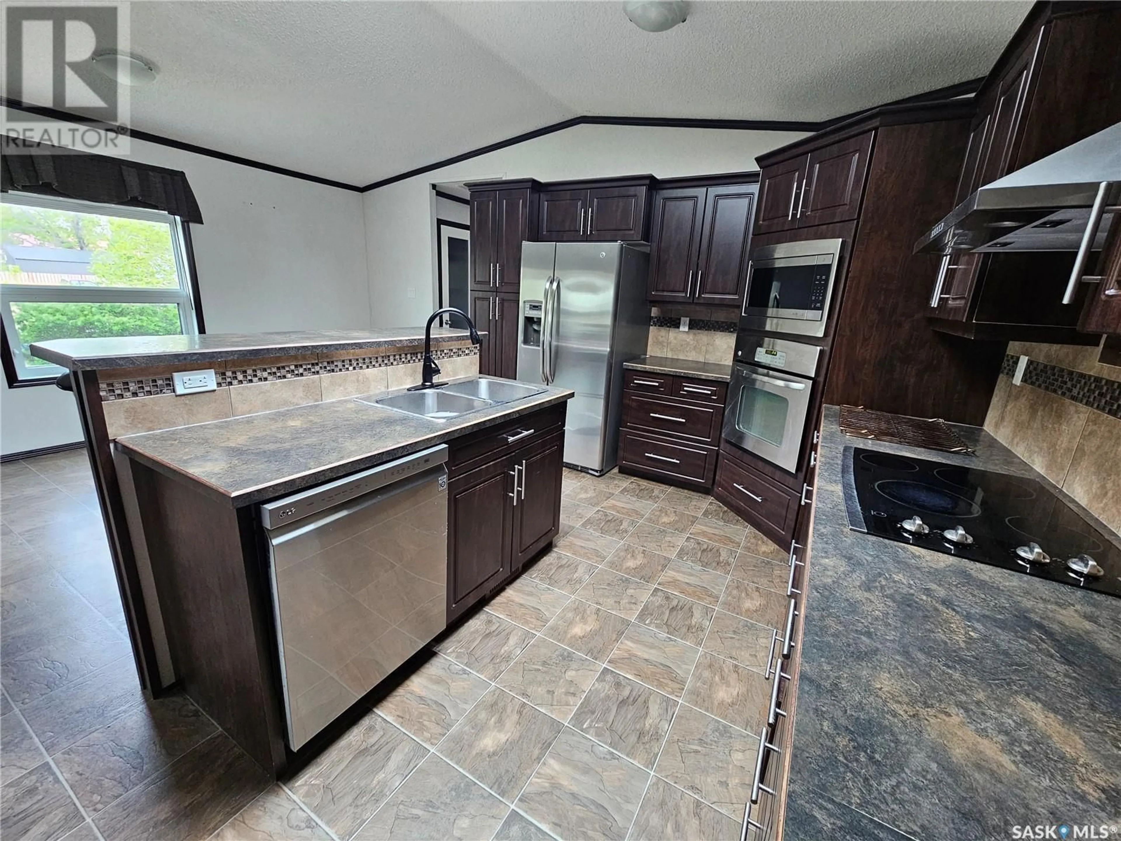 Open concept kitchen, ceramic/tile floor for 345 RAILWAY AVENUE, Briercrest Saskatchewan S0H0K0