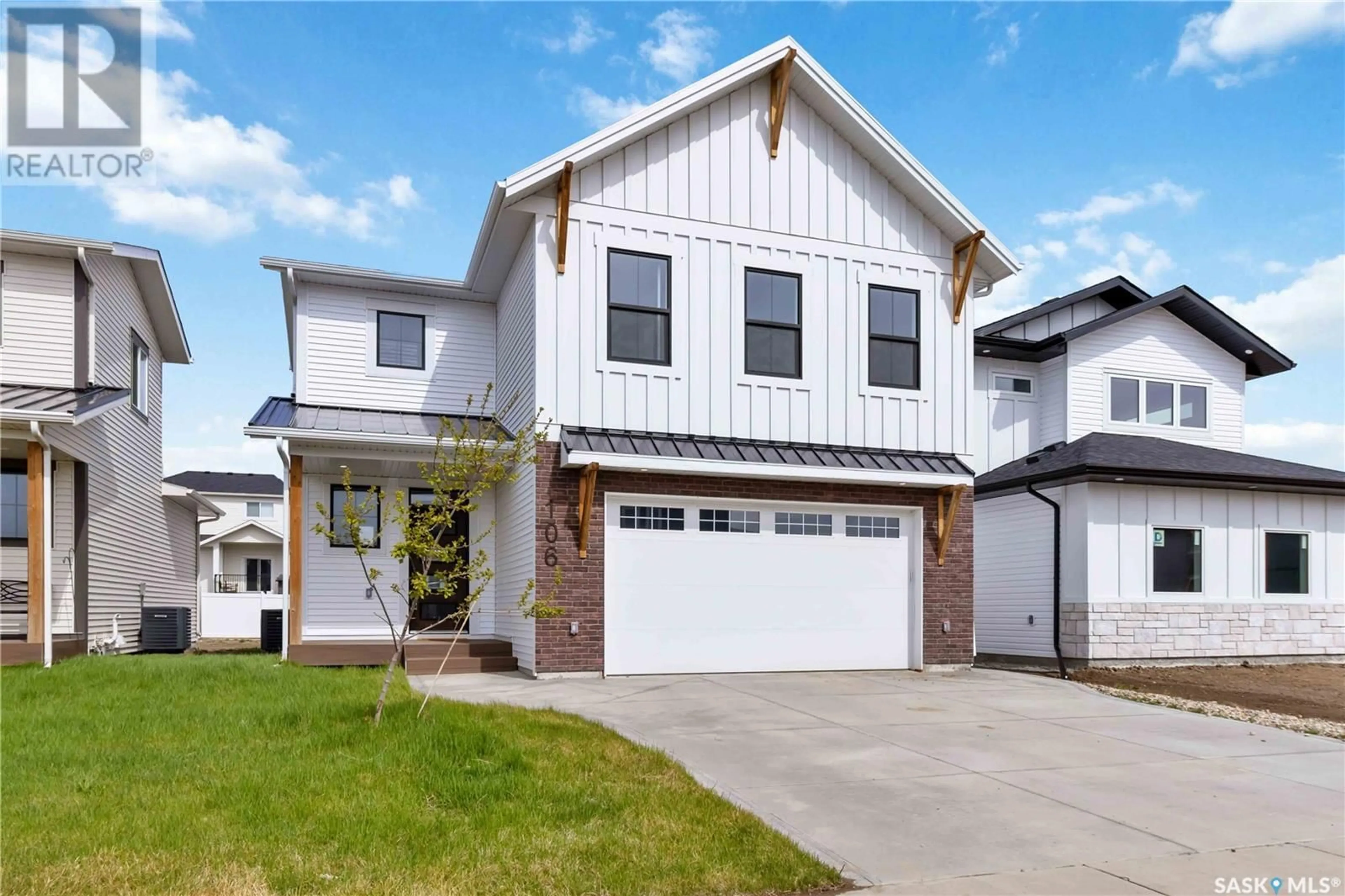 Home with vinyl exterior material, street for 106 HAVERSTOCK CRESCENT, Saskatoon Saskatchewan S7W1E2