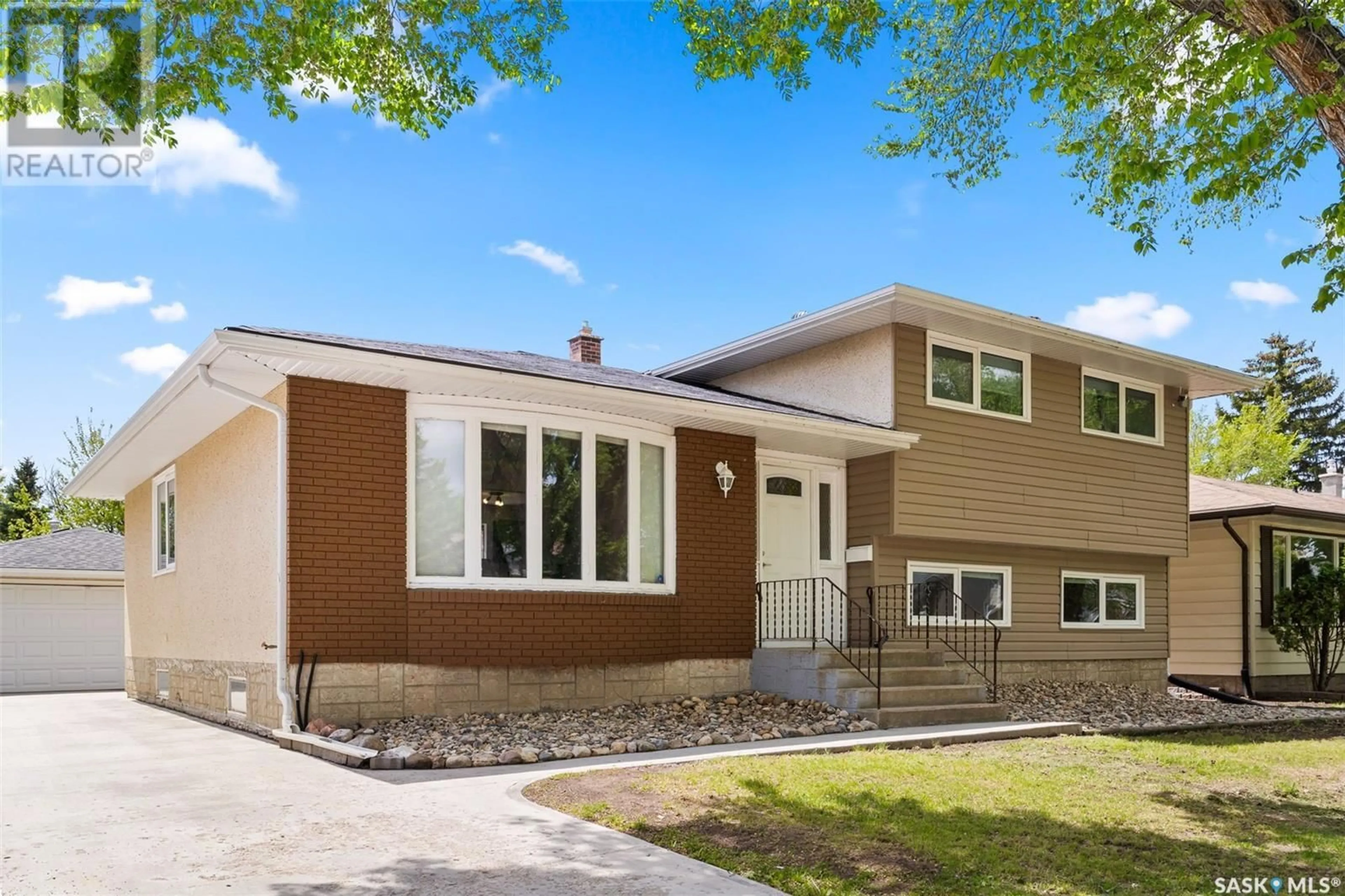 Home with vinyl exterior material, street for 47 LAUBACH AVENUE, Regina Saskatchewan S4S6C3