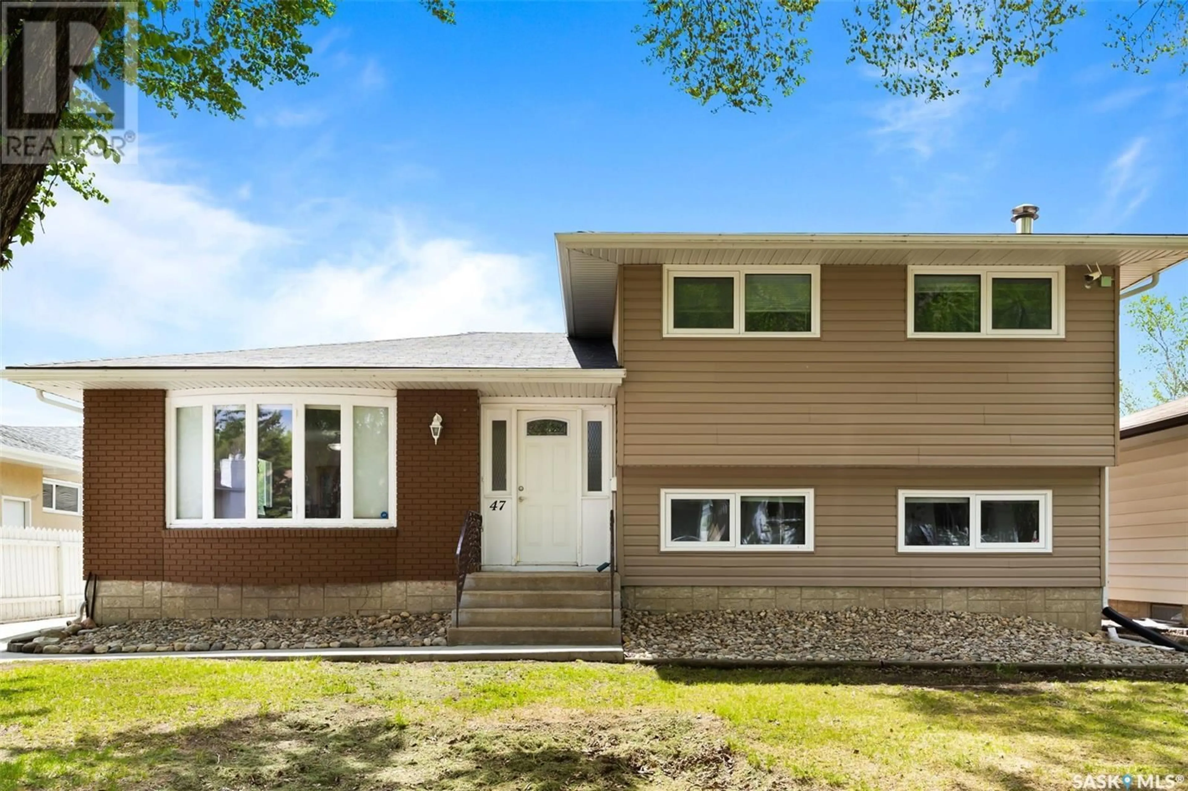 Home with vinyl exterior material, street for 47 LAUBACH AVENUE, Regina Saskatchewan S4S6C3
