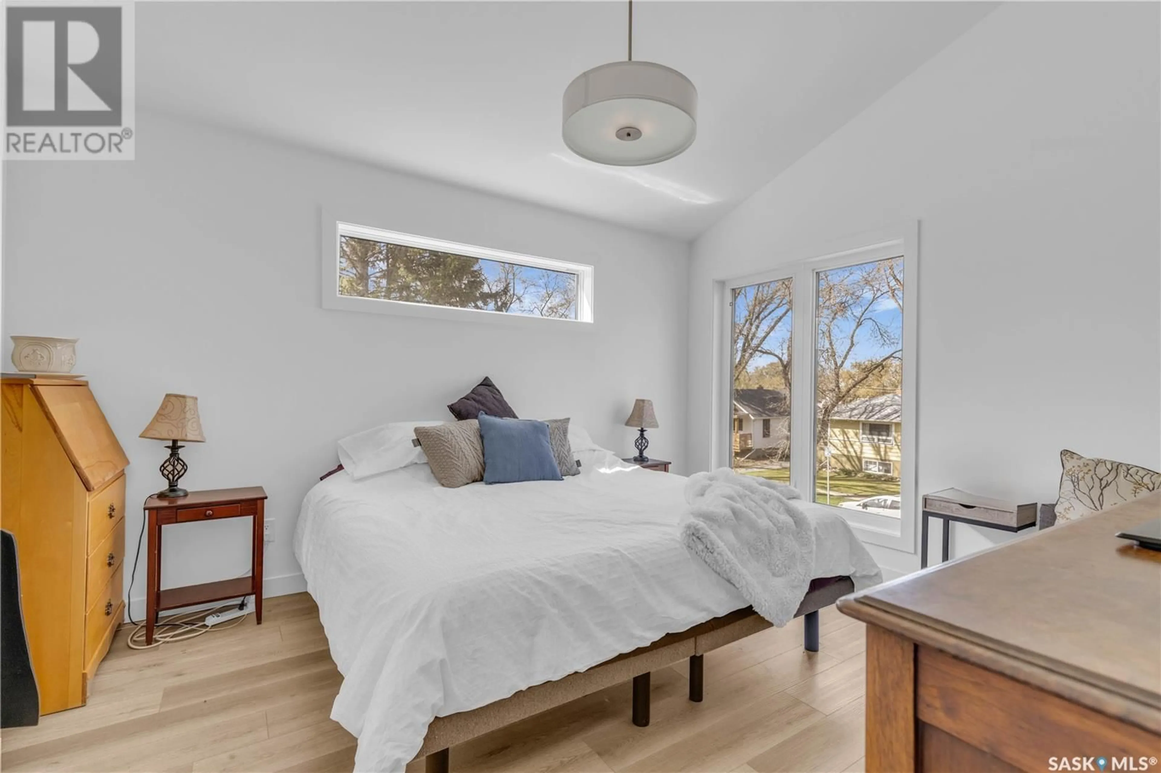Bedroom with bed, wood/laminate floor for 1603 COY AVENUE, Saskatoon Saskatchewan S7M0H5