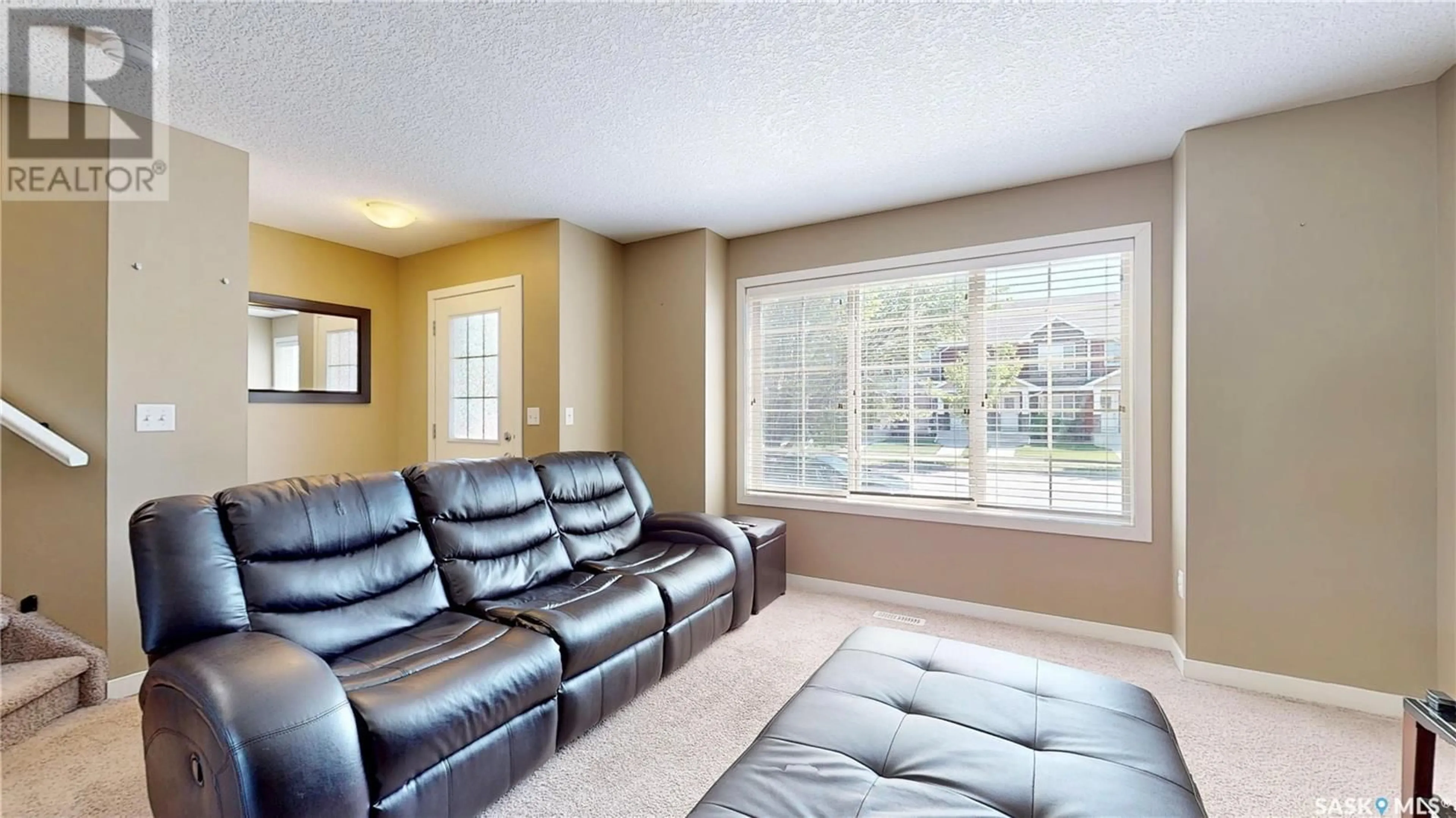 Living room with furniture, unknown for 5122 JIM CAIRNS BOULEVARD, Regina Saskatchewan S4W0E9