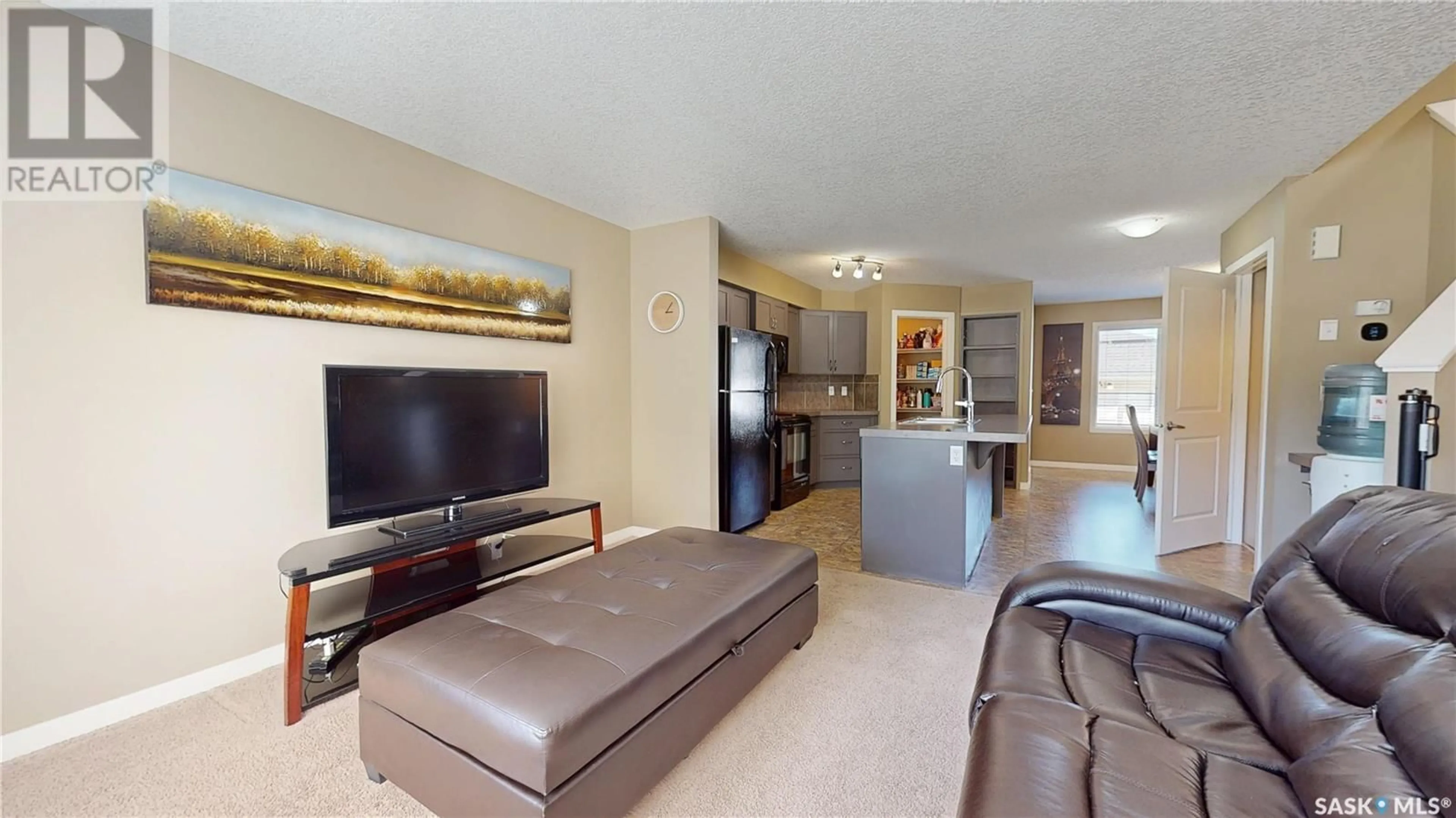 Living room with furniture, unknown for 5122 JIM CAIRNS BOULEVARD, Regina Saskatchewan S4W0E9