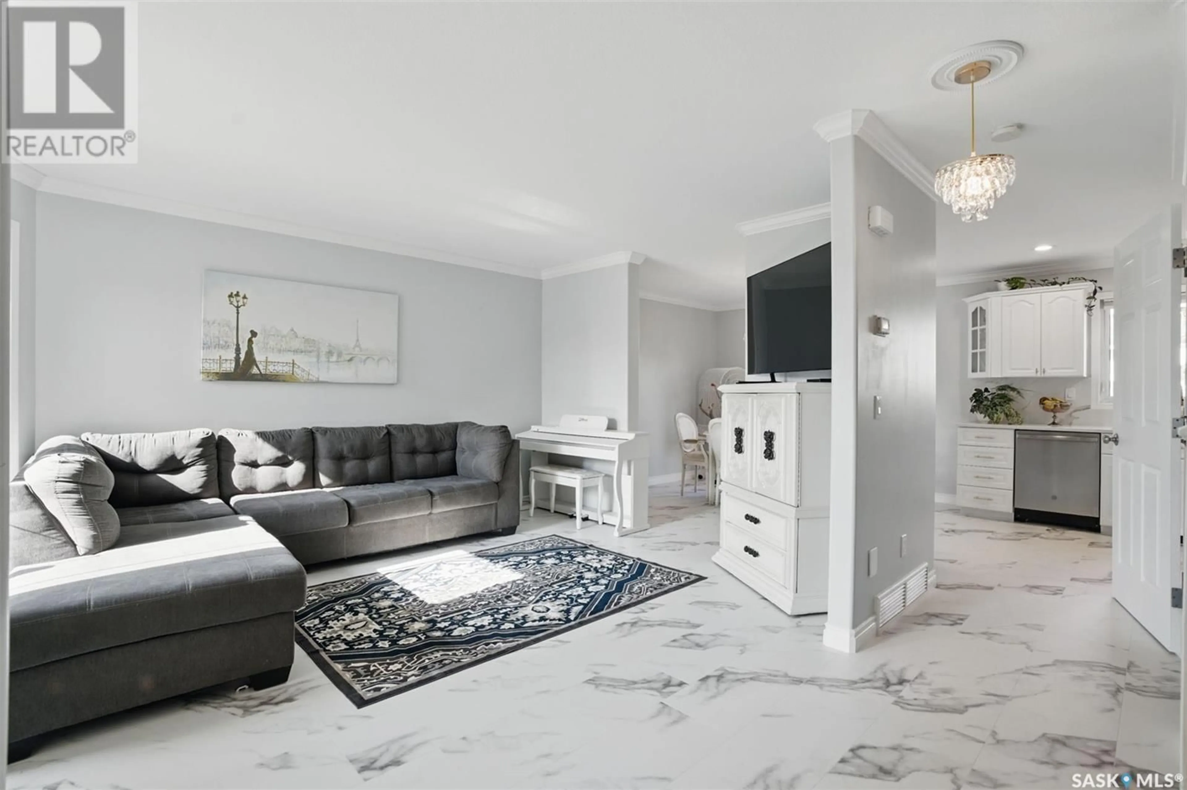 Living room with furniture, ceramic/tile floor for 204 CRYSTAL VILLA, Warman Saskatchewan S0K0A1