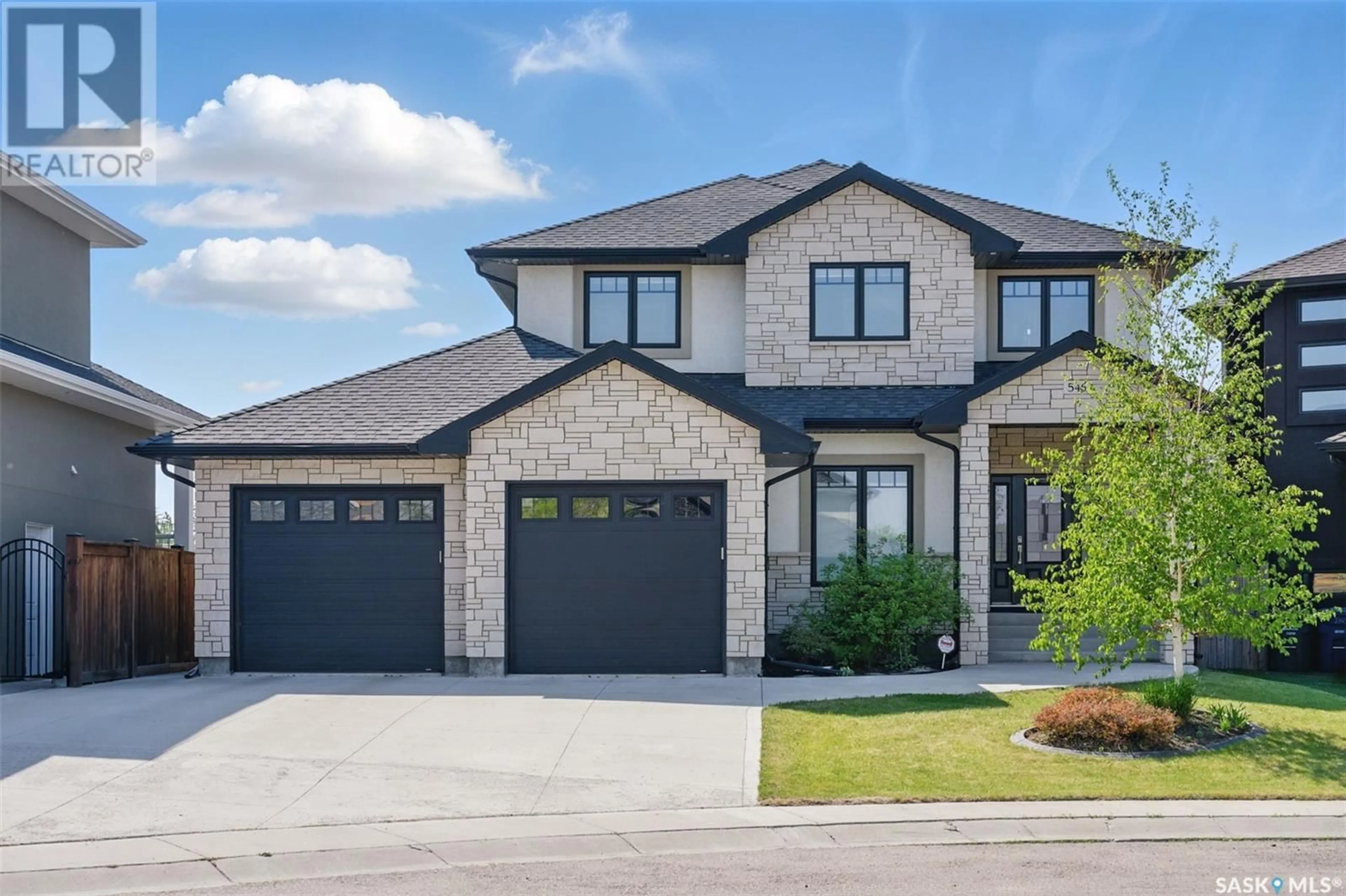 Home with brick exterior material, street for 546 SAUER TERRACE, Saskatoon Saskatchewan S7W0J8