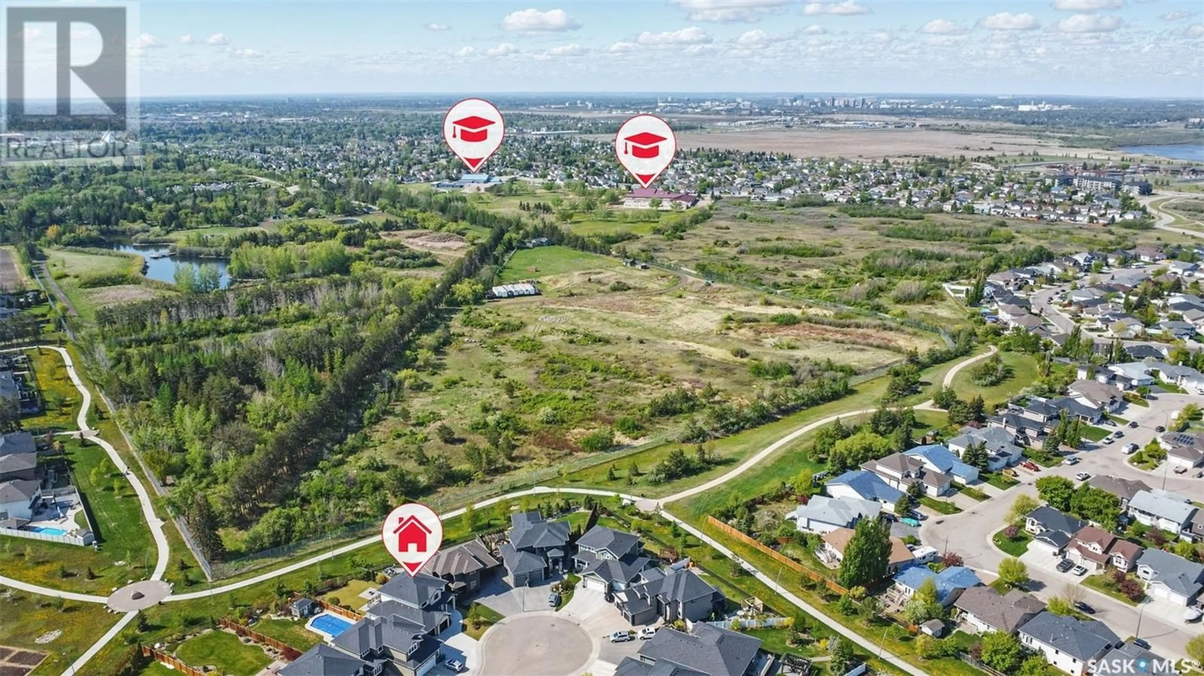 A pic from outside/outdoor area/front of a property/back of a property/a pic from drone, water/lake/river/ocean view for 546 SAUER TERRACE, Saskatoon Saskatchewan S7W0J8