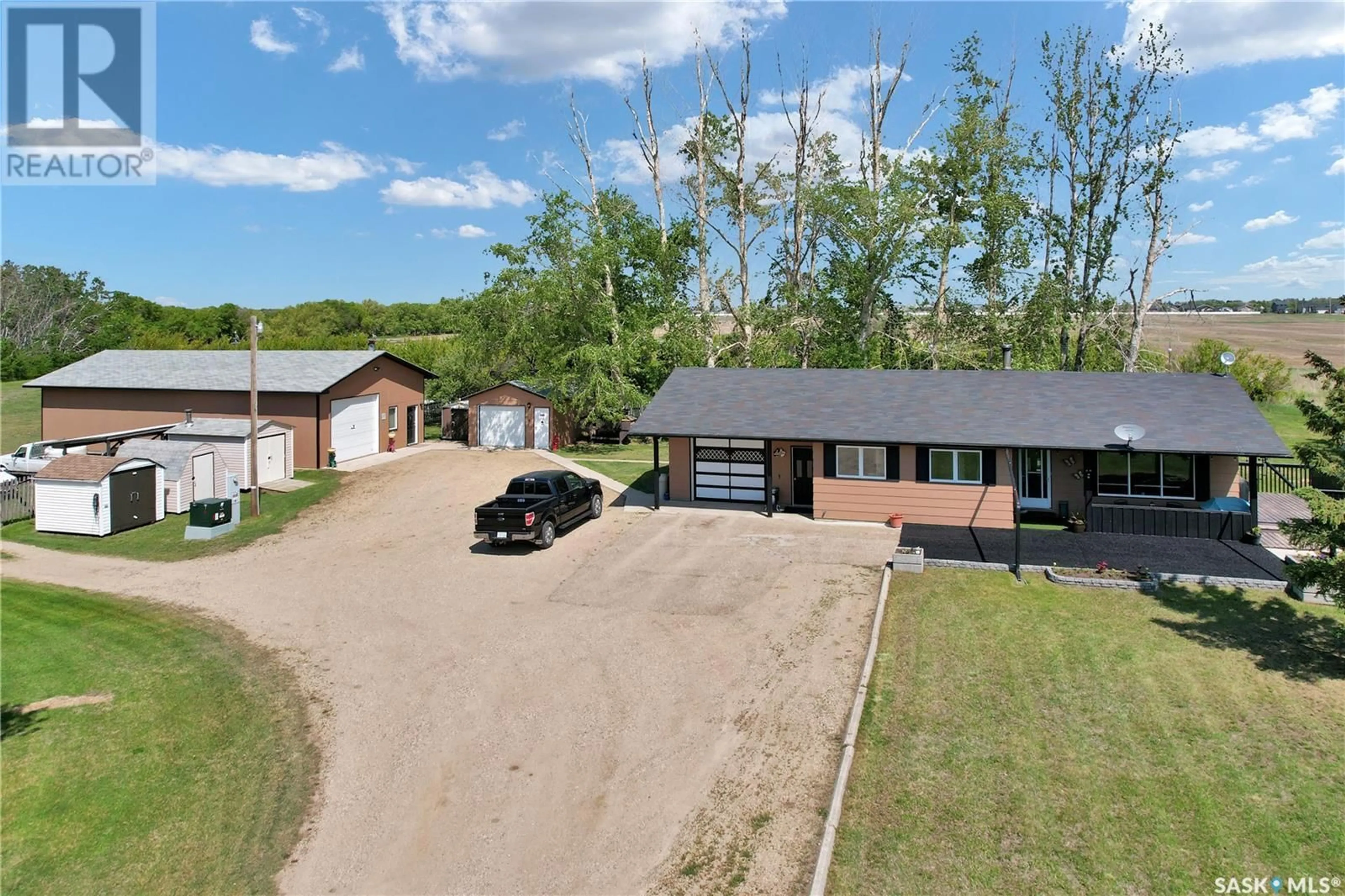 A pic from outside/outdoor area/front of a property/back of a property/a pic from drone, street for WARMAN ACREAGE, Warman Saskatchewan S0K4S0