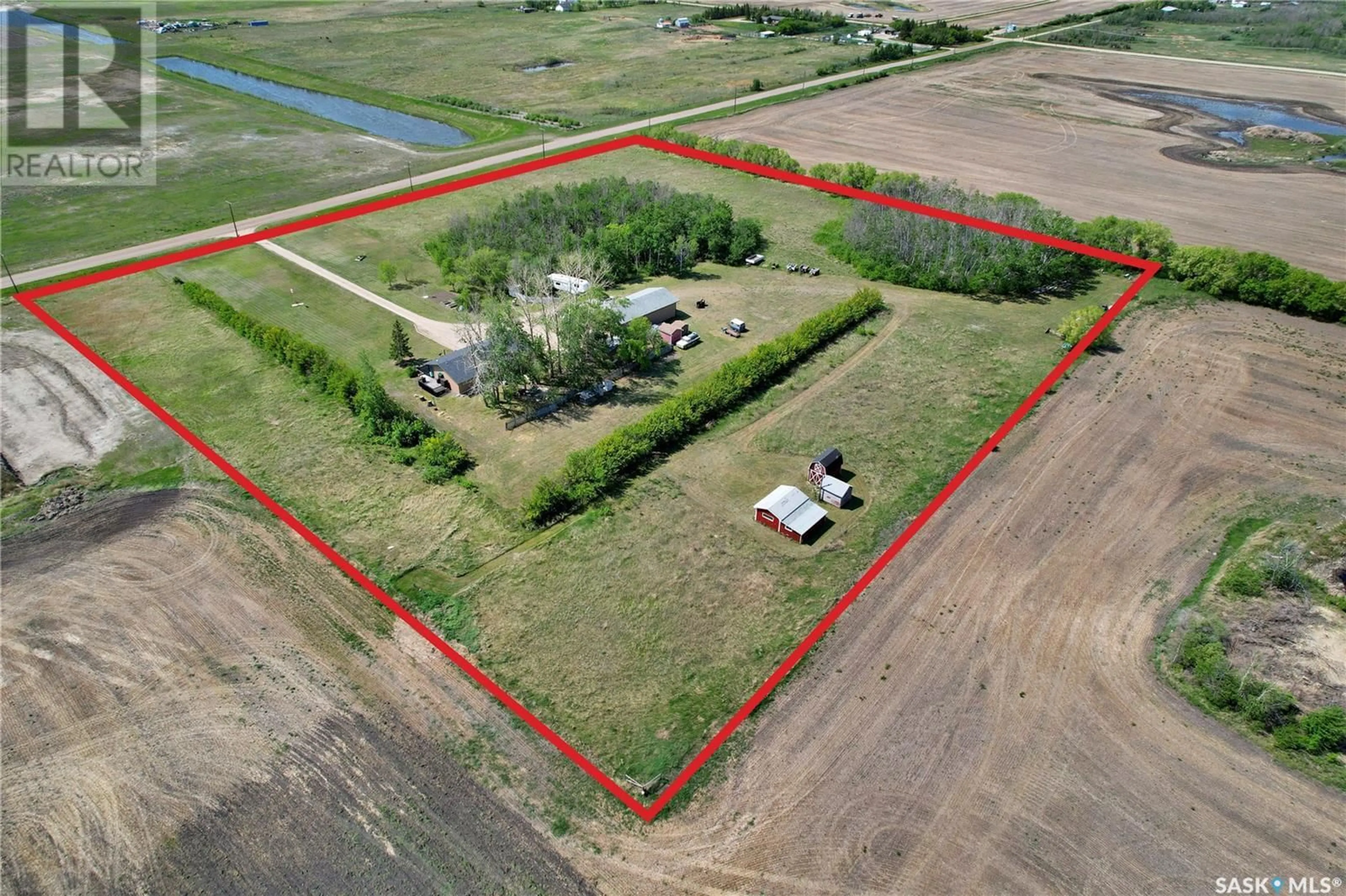 A pic from outside/outdoor area/front of a property/back of a property/a pic from drone, building for WARMAN ACREAGE, Warman Saskatchewan S0K4S0