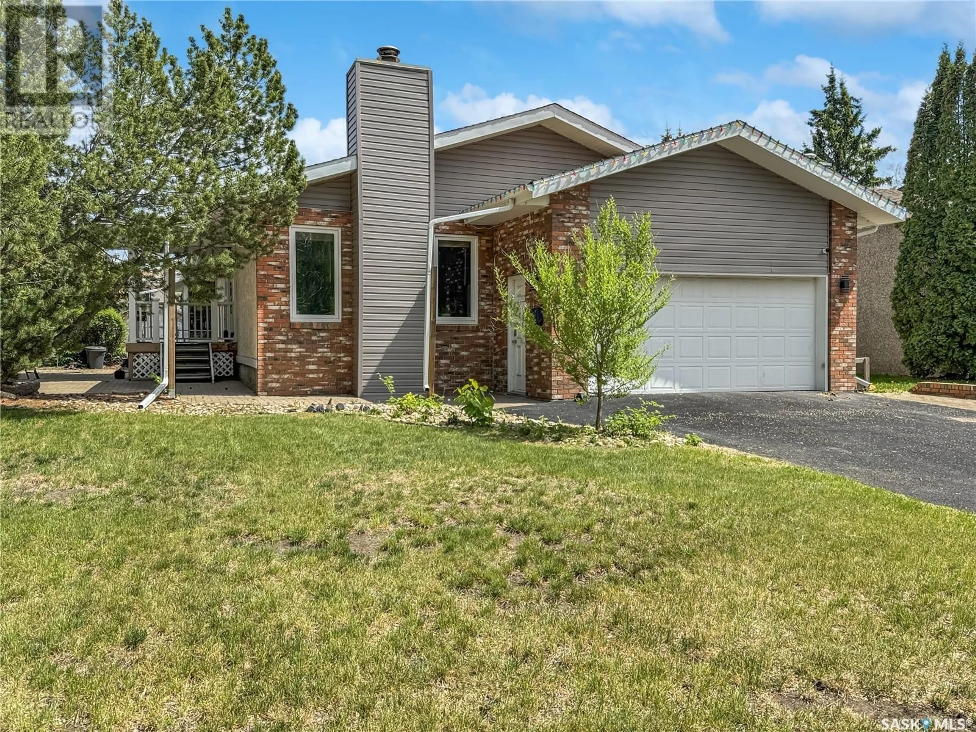 Home with vinyl exterior material, street for 10818 MEIGHEN CRESCENT, North Battleford Saskatchewan S9A3L3