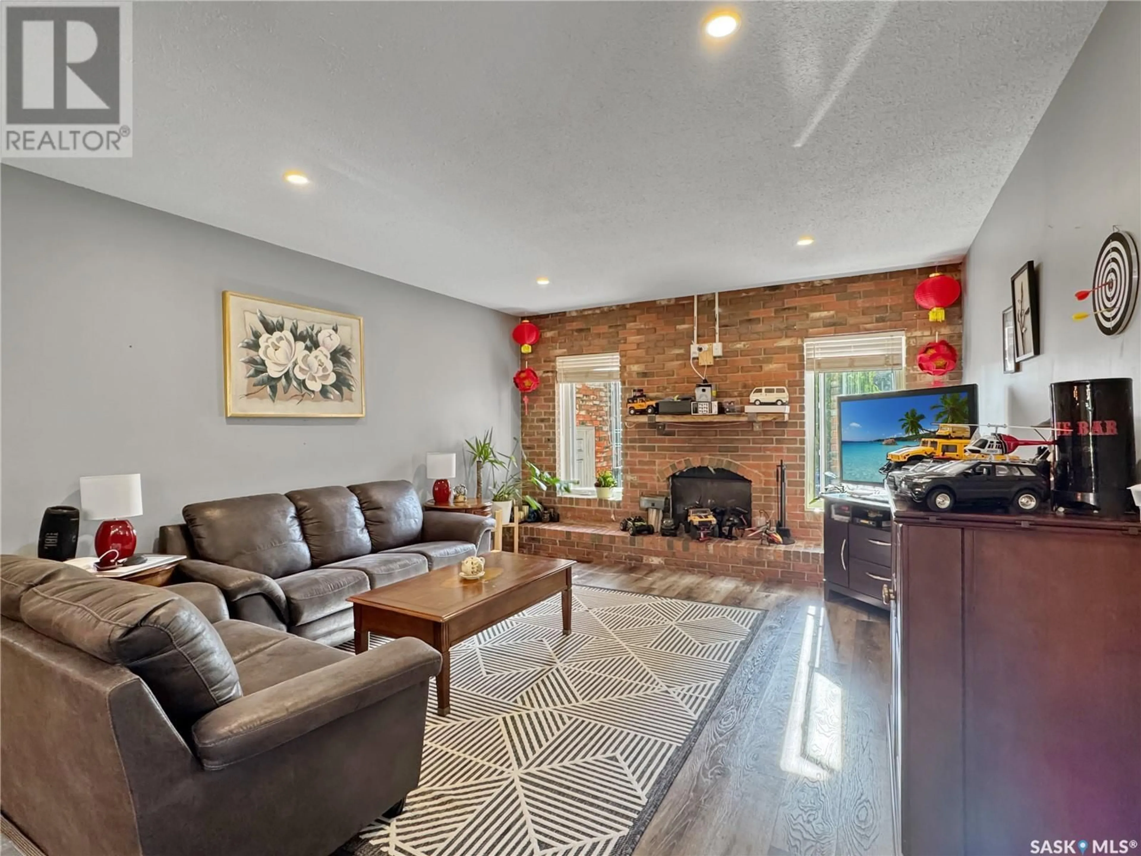 Living room with furniture, unknown for 10818 MEIGHEN CRESCENT, North Battleford Saskatchewan S9A3L3