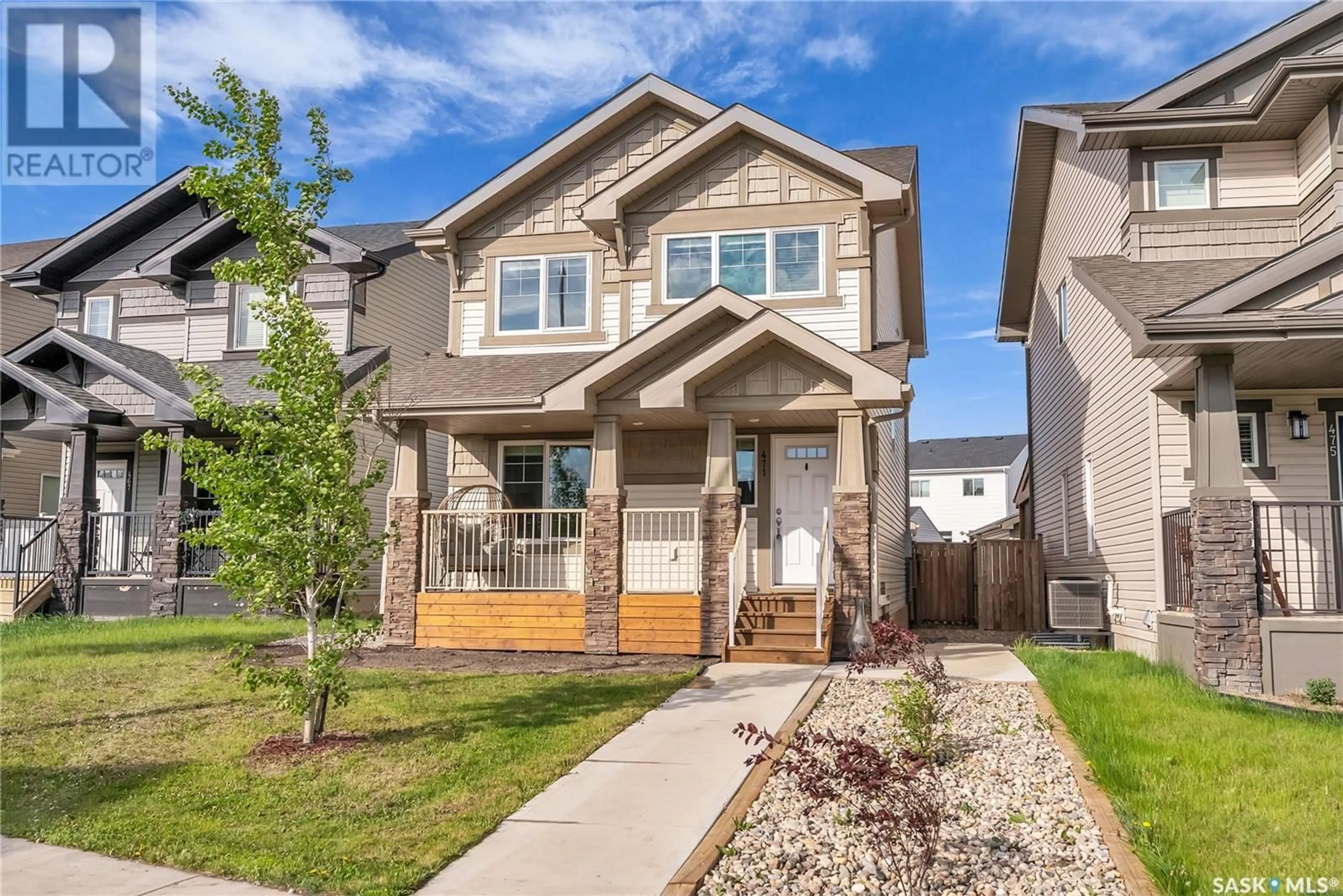 Home with vinyl exterior material, street for 471 SECORD WAY, Saskatoon Saskatchewan S7V0M3