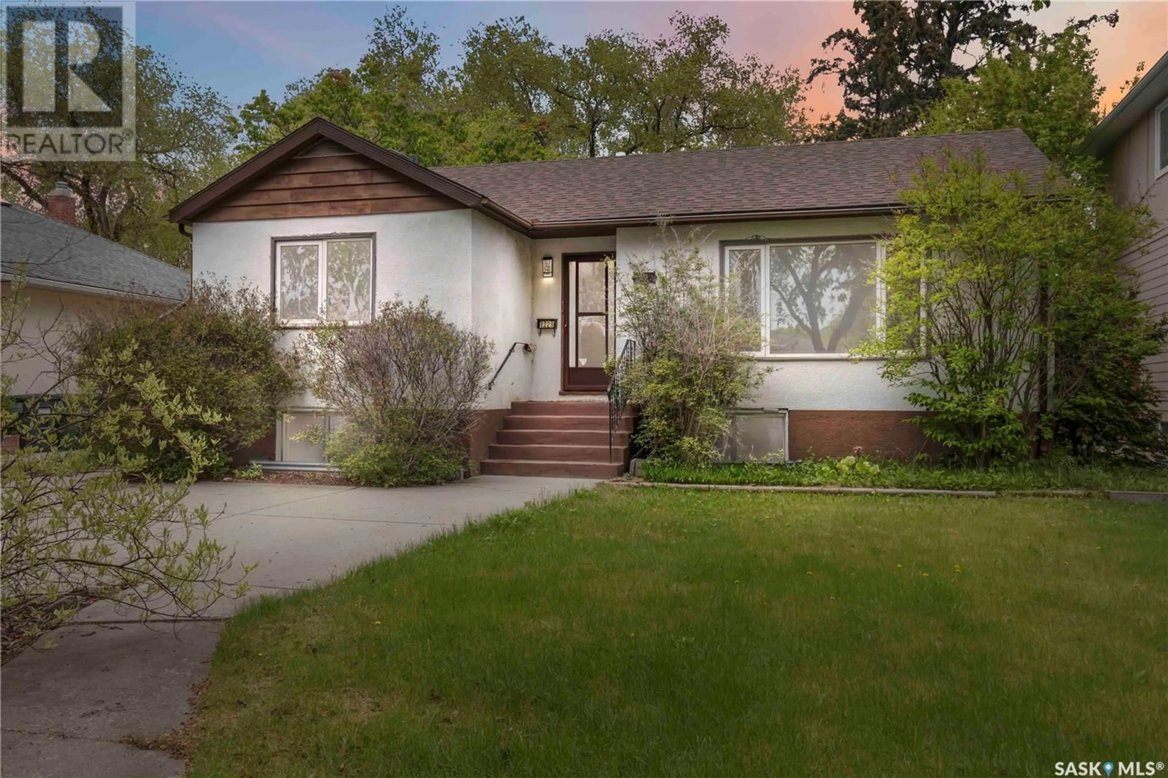 Home with vinyl exterior material, street for 1229 9TH STREET, Saskatoon Saskatchewan S7H0N7