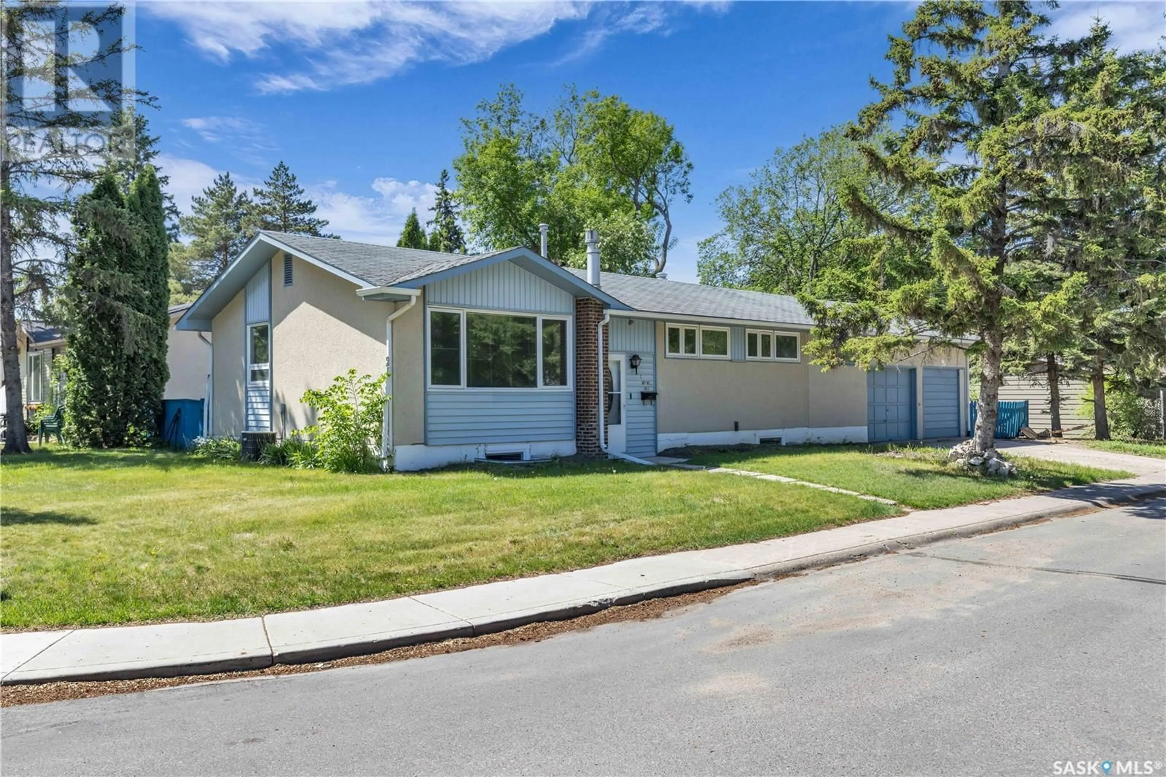 Home with vinyl exterior material, street for 2 BRITNELL CRESCENT, Saskatoon Saskatchewan S7H3X8