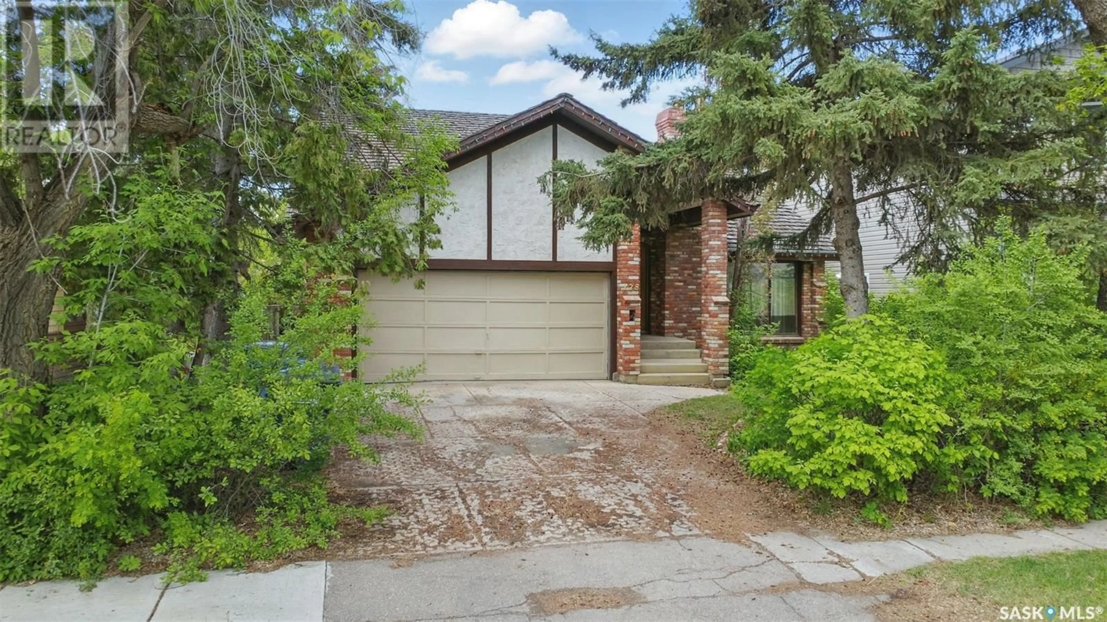 Home with brick exterior material, street for 128 112TH STREET, Saskatoon Saskatchewan S7N1T9